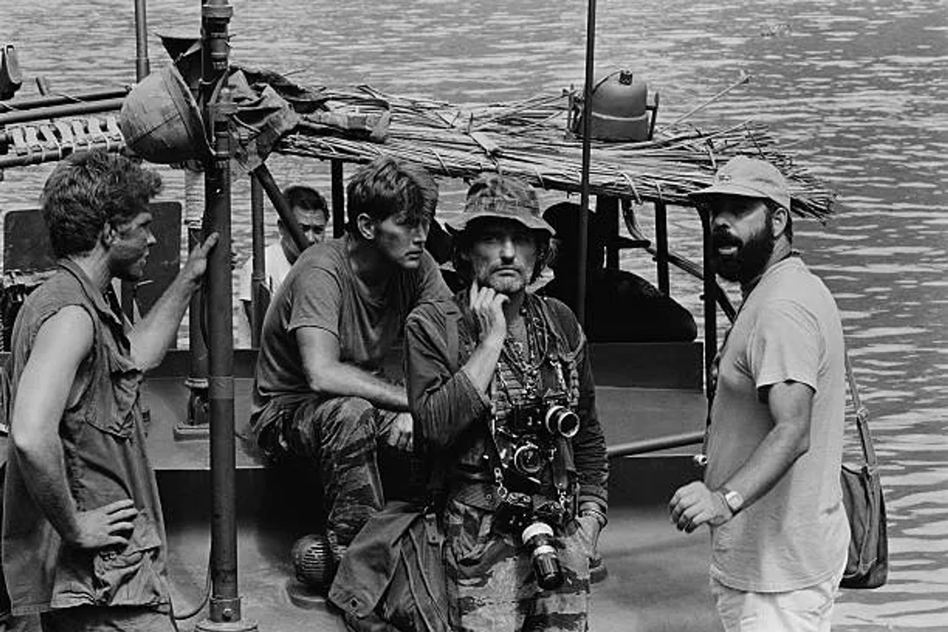 Francis Ford Coppola, Dennis Hopper, Martin Sheen, and Sam Bottoms in Apocalypse Now (1979)