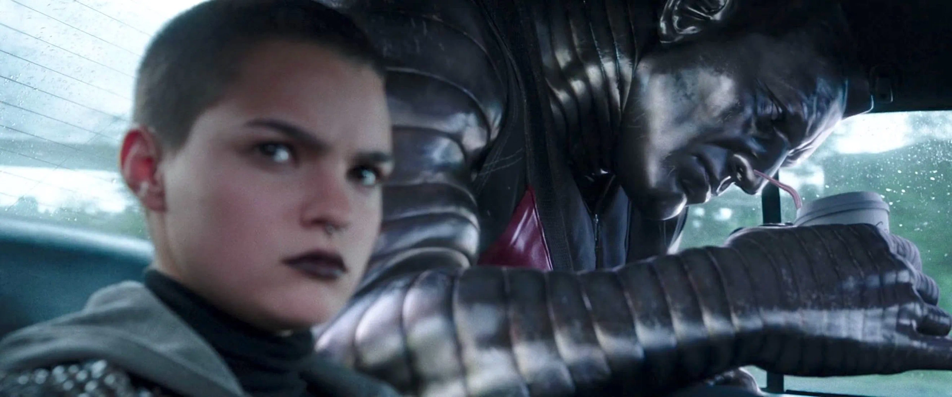 Stefan Kapicic and Brianna Hildebrand in Deadpool (2016)