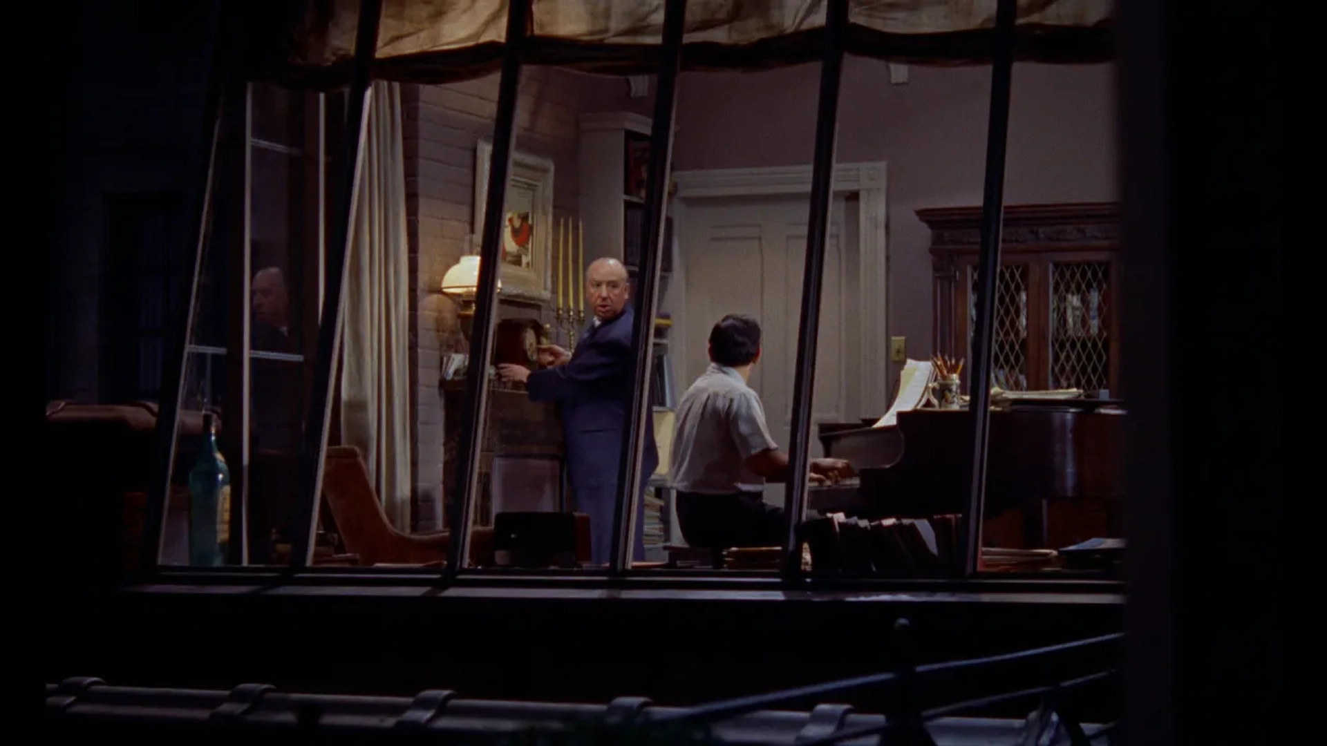 Alfred Hitchcock and Ross Bagdasarian in Rear Window (1954)