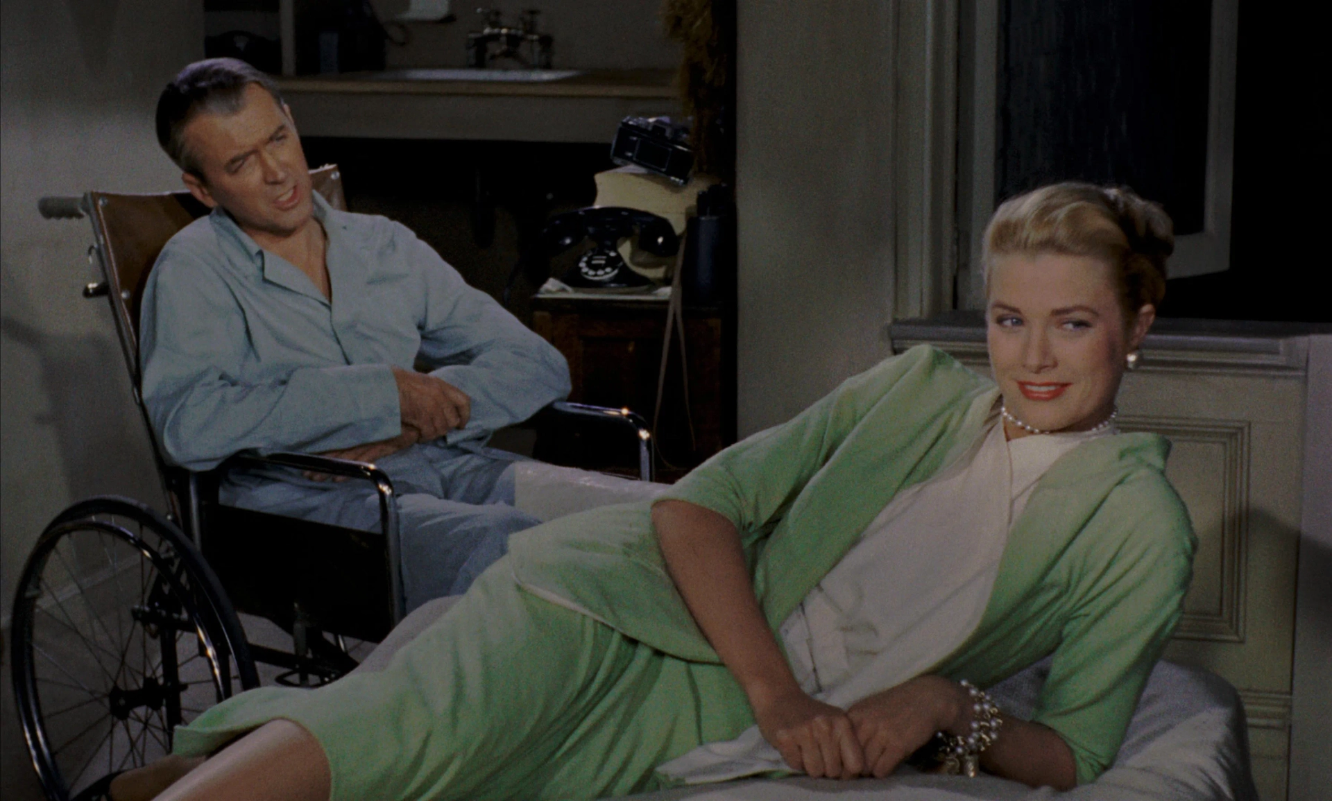 Grace Kelly and James Stewart in Rear Window (1954)