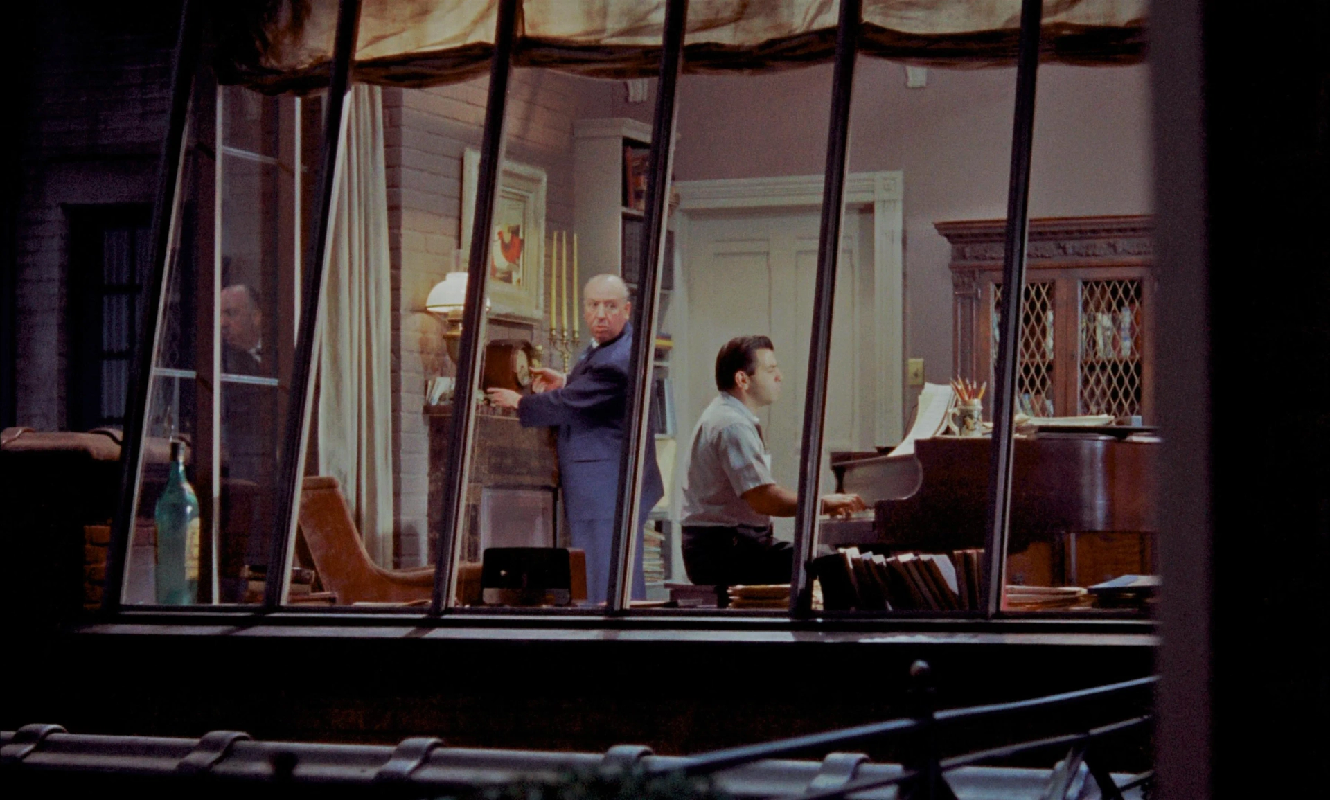 Alfred Hitchcock and Ross Bagdasarian in Rear Window (1954)