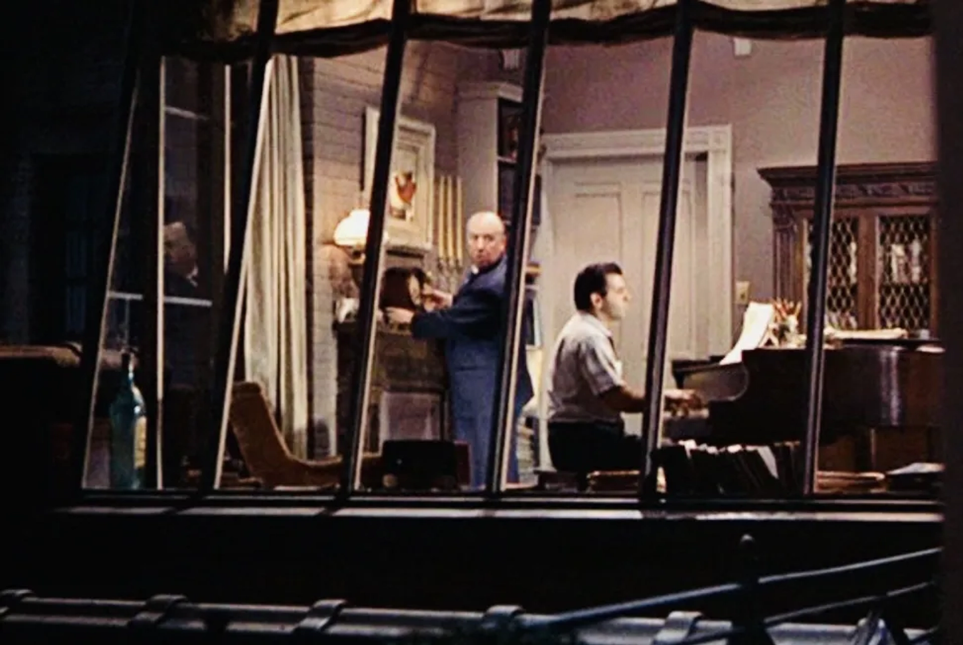 Alfred Hitchcock and Ross Bagdasarian in Rear Window (1954)