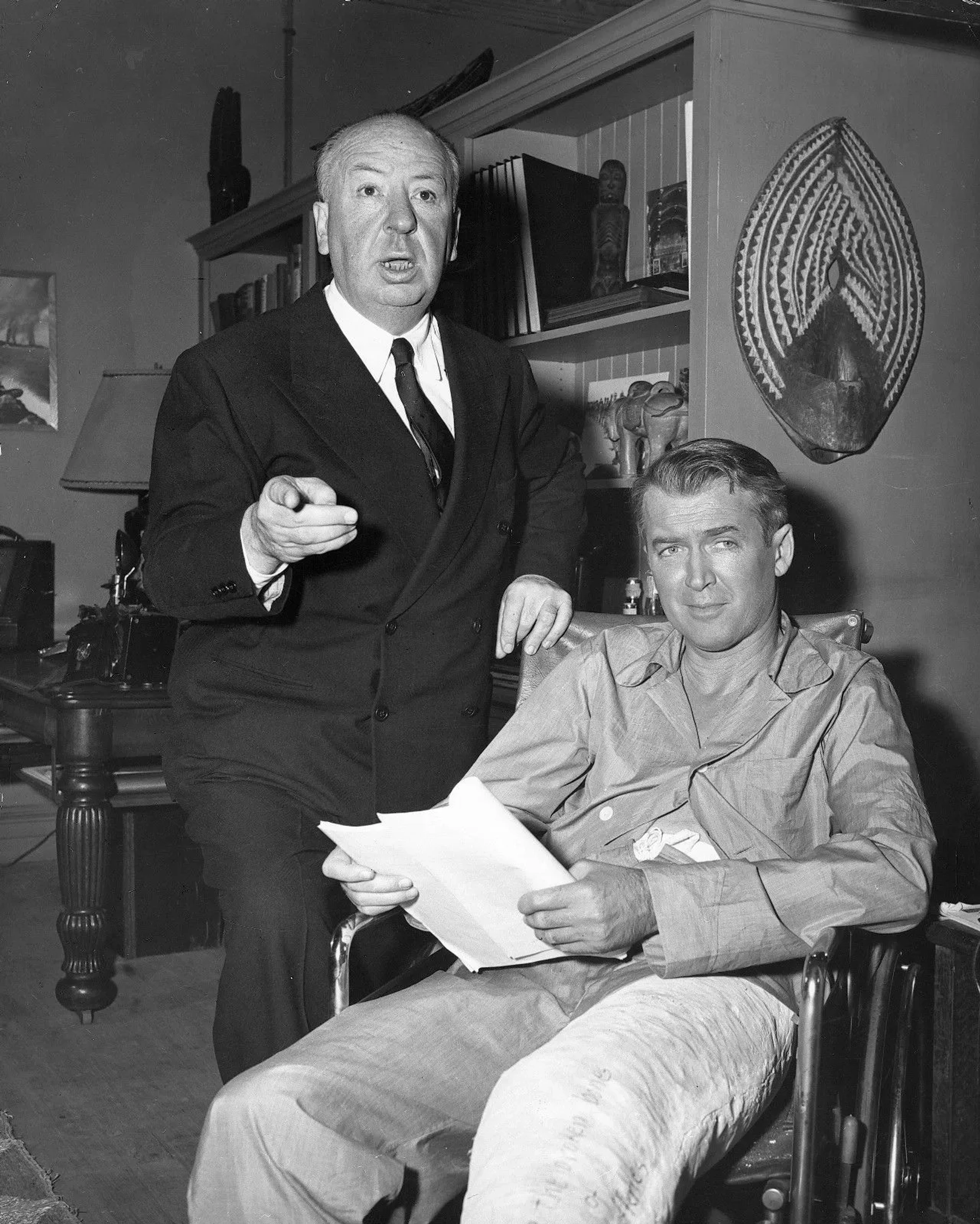 Alfred Hitchcock and James Stewart in Rear Window (1954)