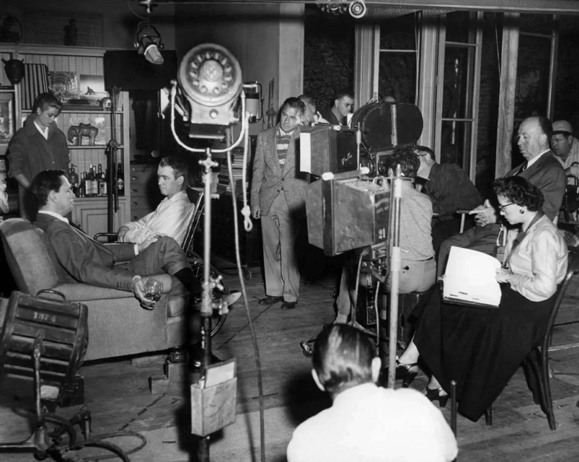 Alfred Hitchcock, Grace Kelly, James Stewart, Wendell Corey, and Irene Ives in Rear Window (1954)