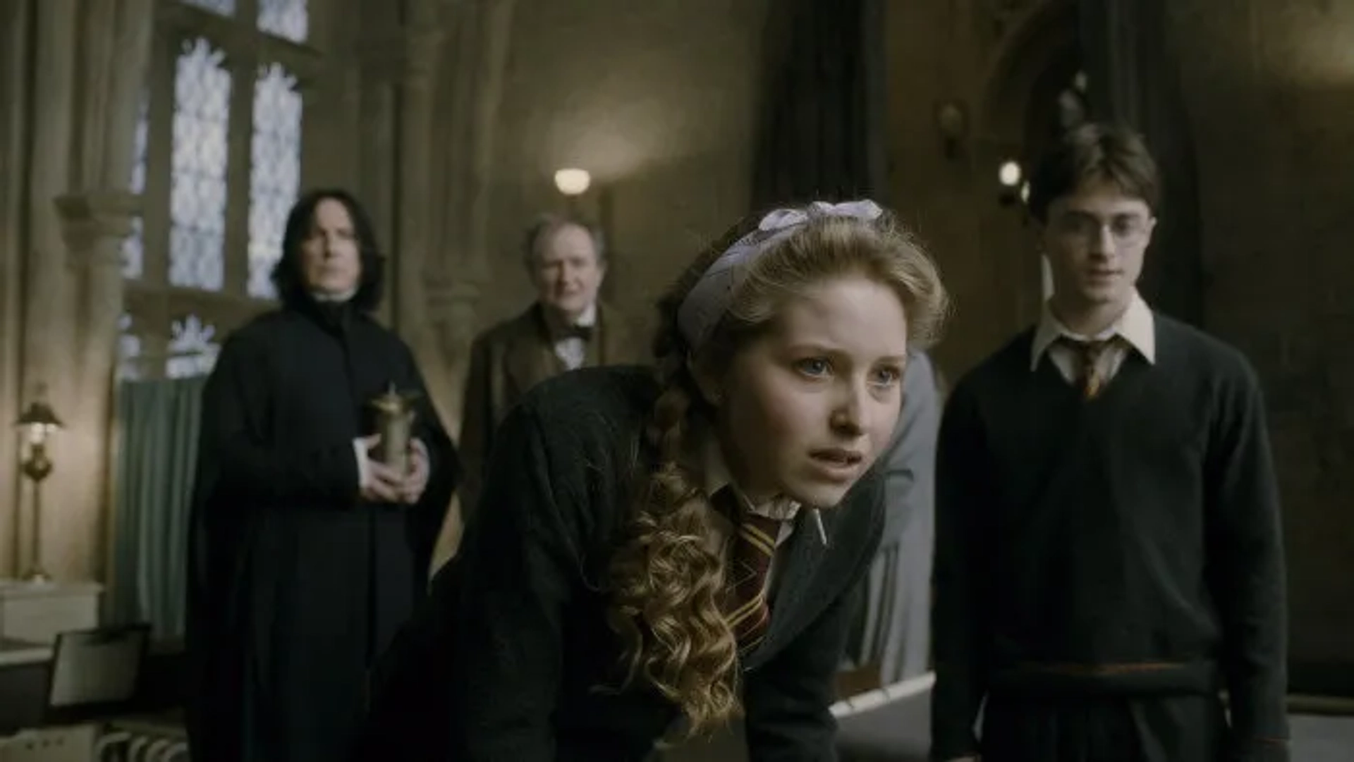 Alan Rickman, Jim Broadbent, Daniel Radcliffe, and Jessie Cave in Harry Potter and the Half-Blood Prince (2009)