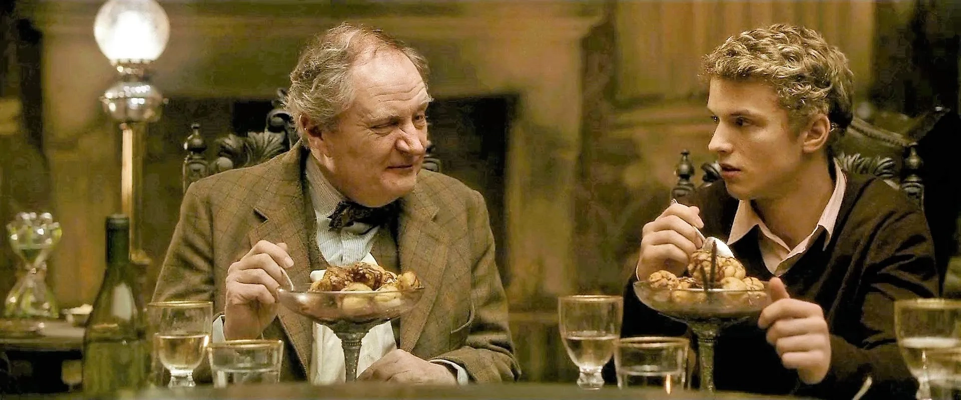 Jim Broadbent and Freddie Stroma in Harry Potter and the Half-Blood Prince (2009)