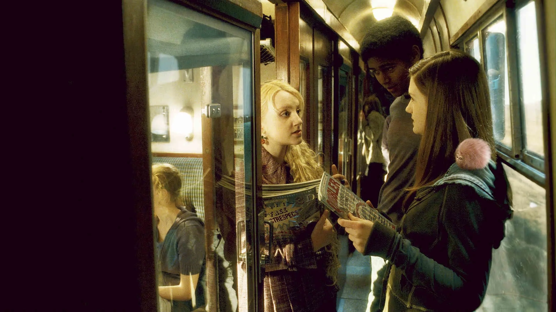 Alfred Enoch, Bonnie Wright, and Evanna Lynch in Harry Potter and the Half-Blood Prince (2009)