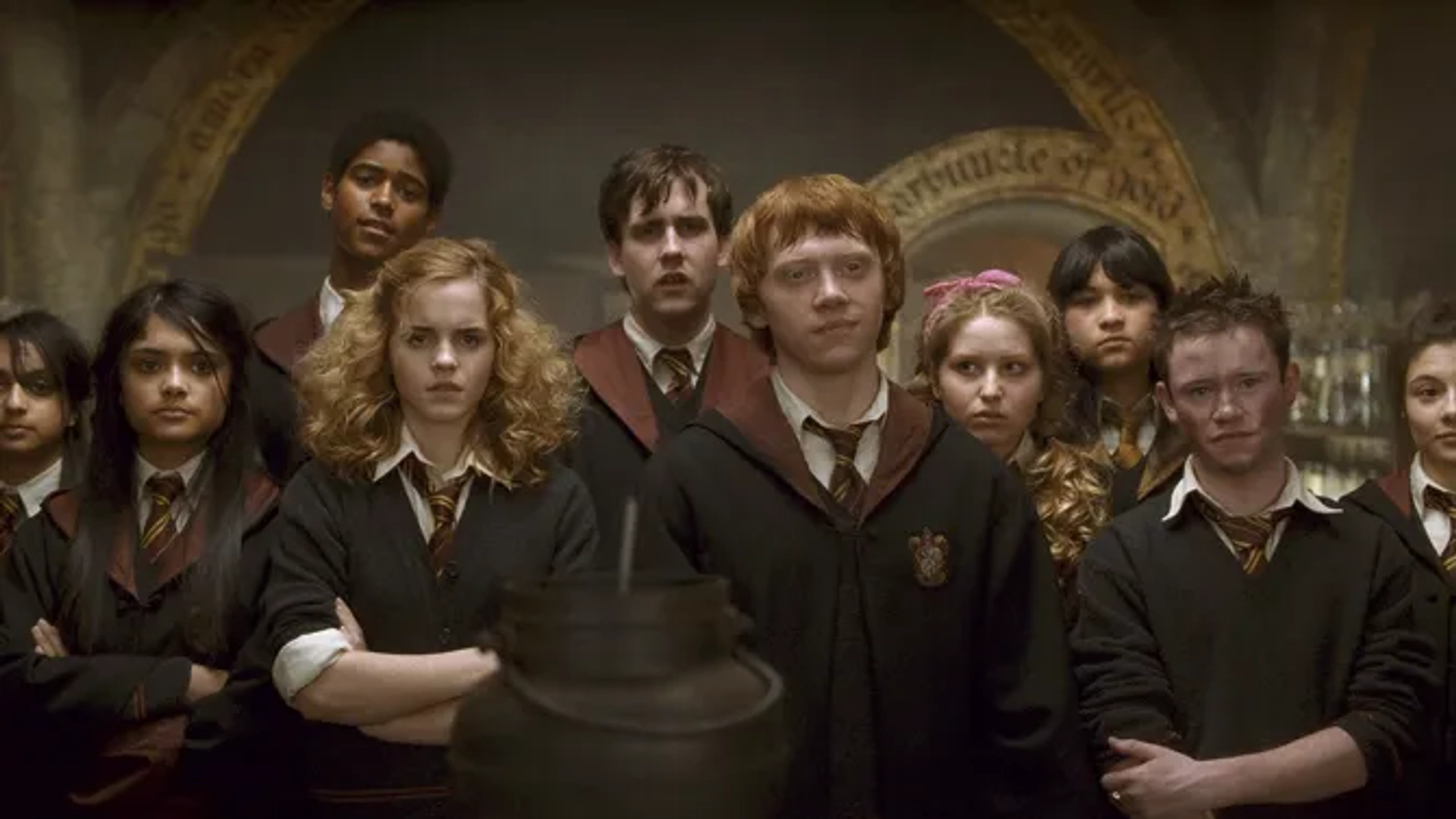 Alfred Enoch, Rupert Grint, Matthew Lewis, Devon Murray, Emma Watson, Georgina Leonidas, Afshan Azad, Shefali Chowdhury, Jessie Cave, and Isabella Laughland in Harry Potter and the Half-Blood Prince (2009)