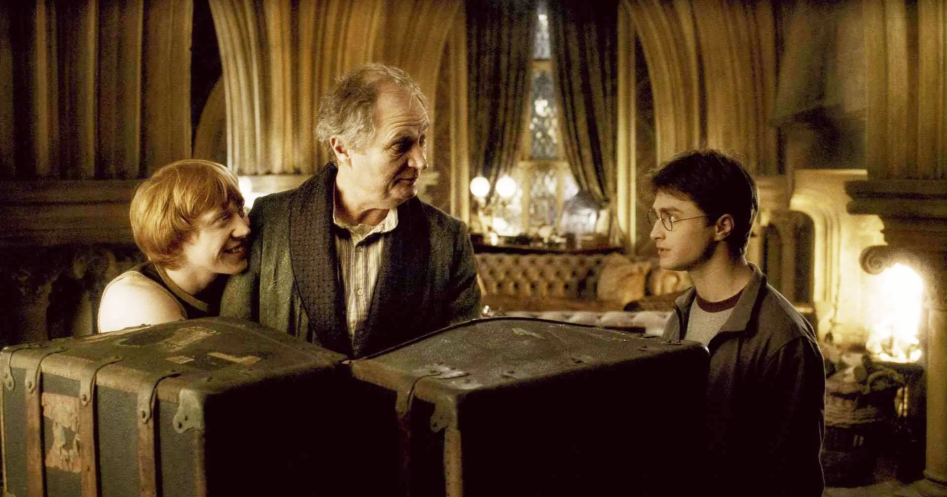 Jim Broadbent, Rupert Grint, and Daniel Radcliffe in Harry Potter and the Half-Blood Prince (2009)