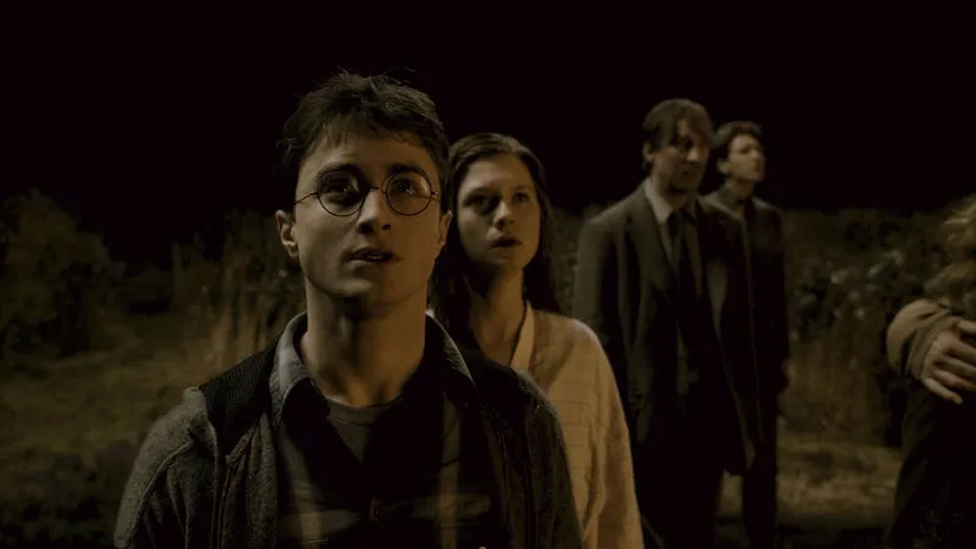 David Thewlis, Daniel Radcliffe, Bonnie Wright, and Oliver Phelps in Harry Potter and the Half-Blood Prince (2009)