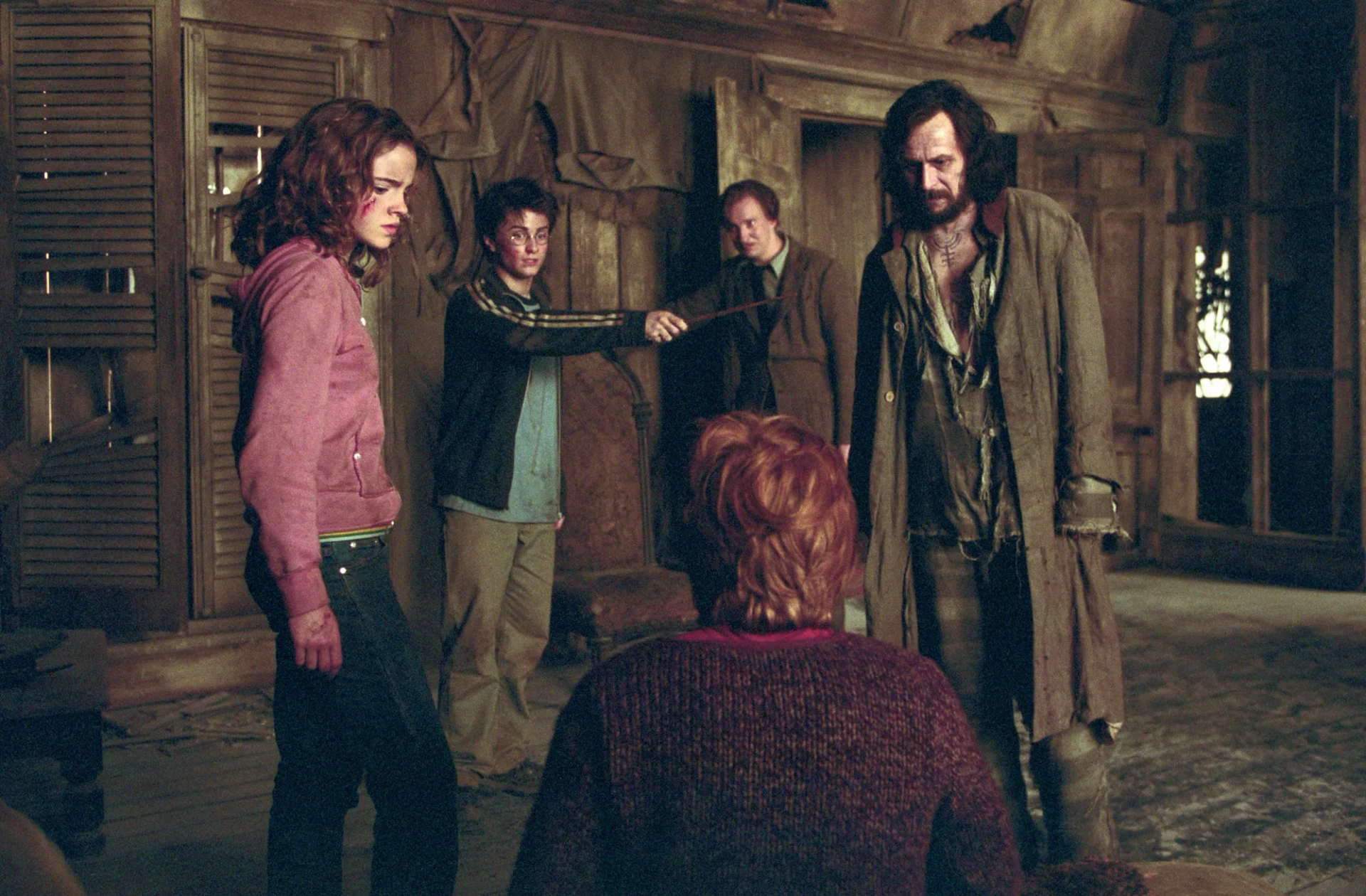 Gary Oldman, David Thewlis, Rupert Grint, Daniel Radcliffe, and Emma Watson in Harry Potter and the Prisoner of Azkaban (2004)