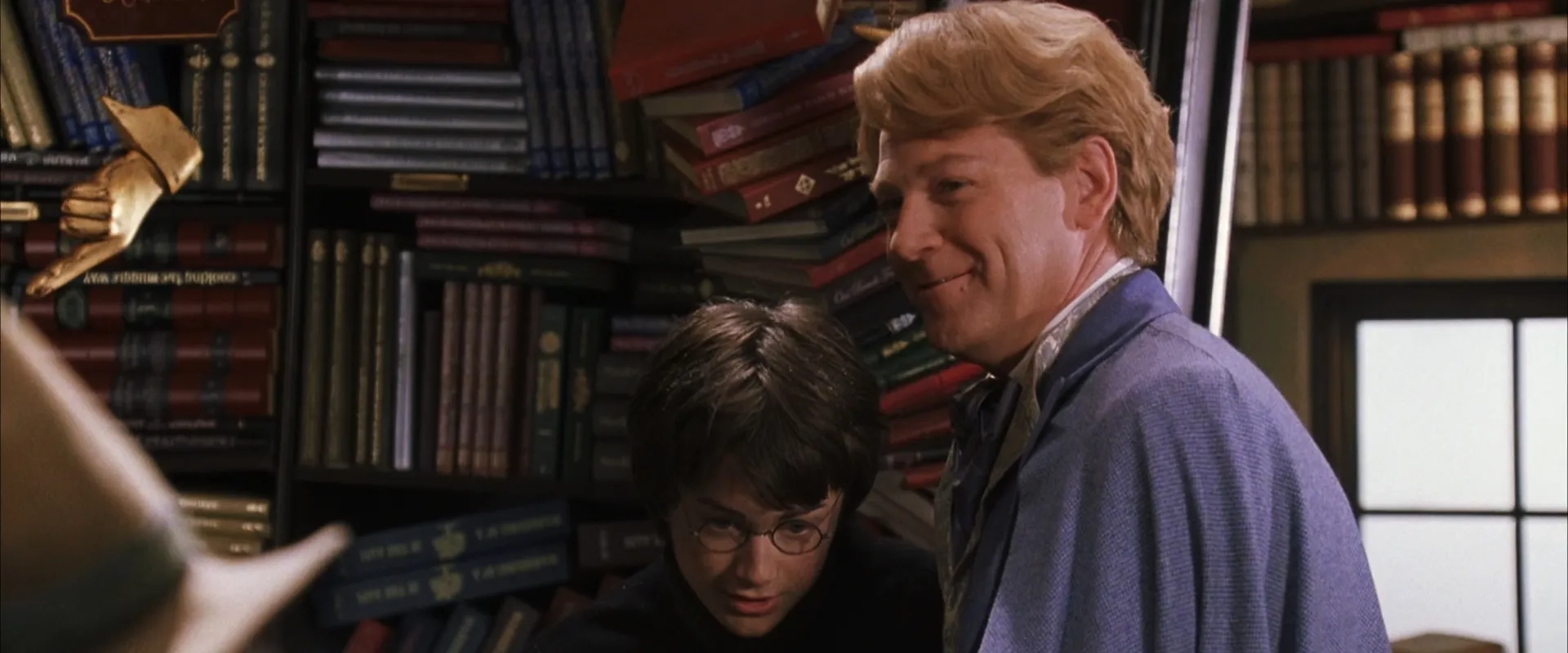 Kenneth Branagh and Daniel Radcliffe in Harry Potter and the Chamber of Secrets (2002)