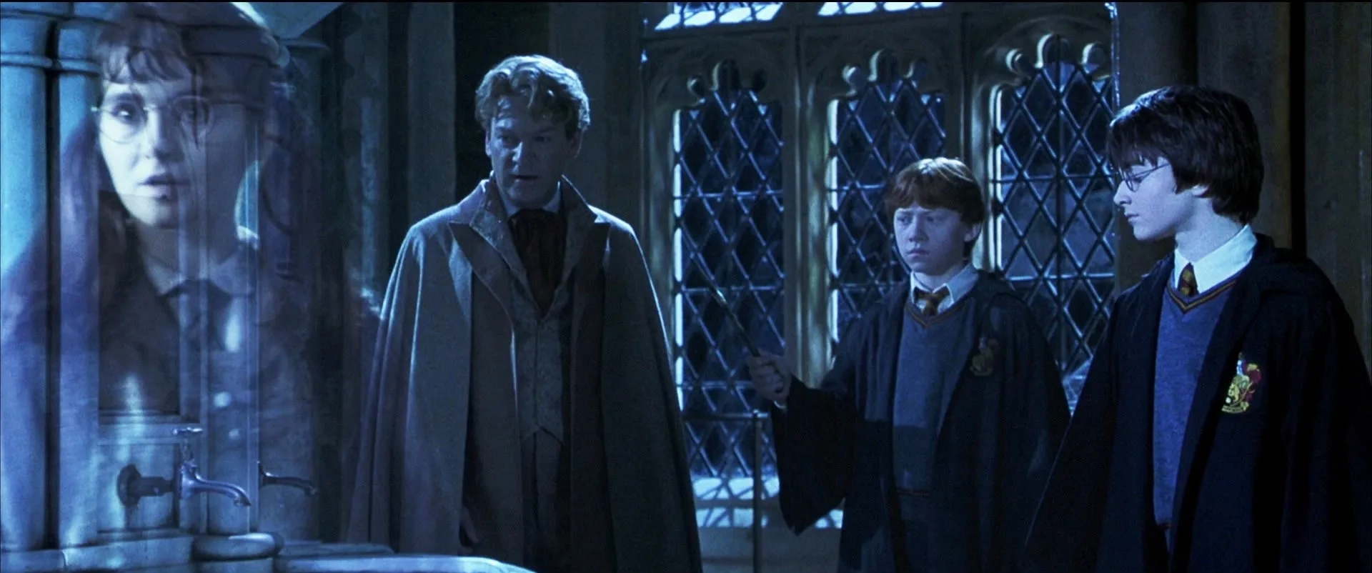 Kenneth Branagh, Rupert Grint, Shirley Henderson, and Daniel Radcliffe in Harry Potter and the Chamber of Secrets (2002)