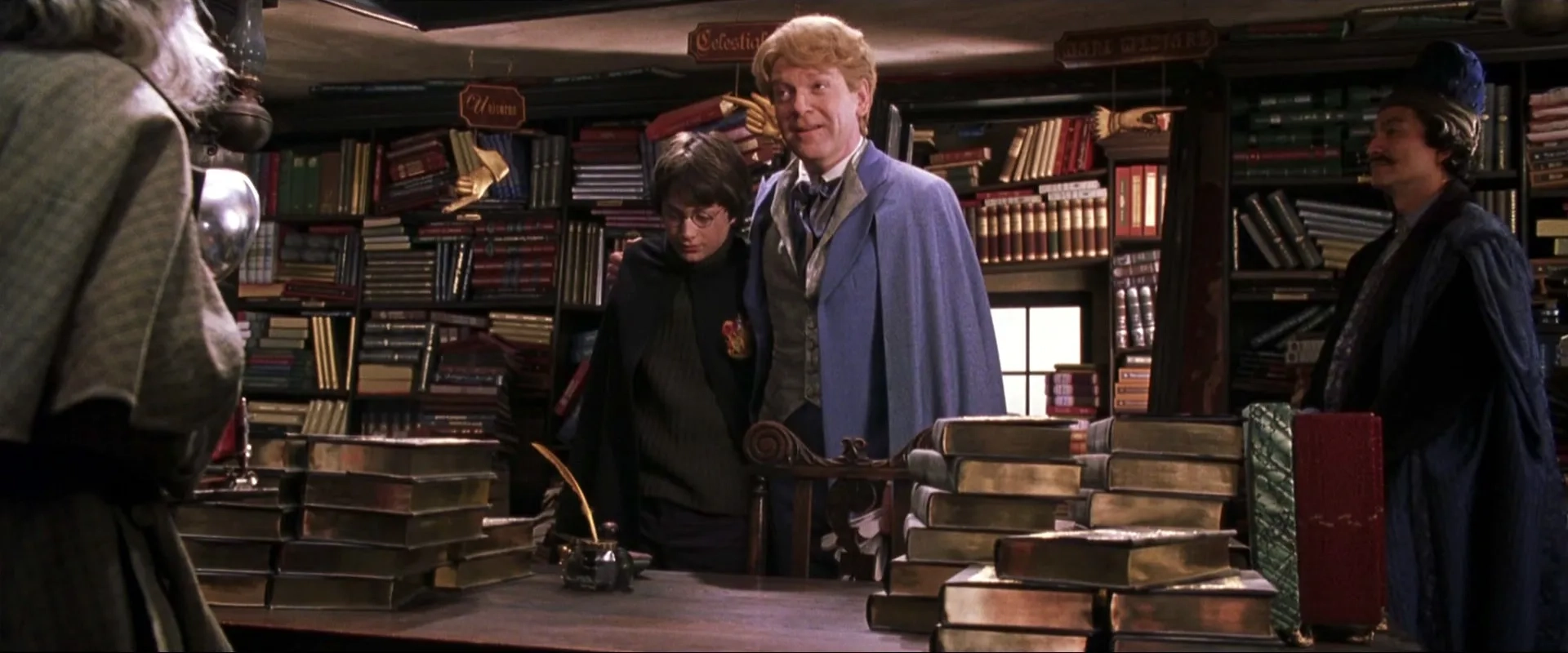 Kenneth Branagh and Daniel Radcliffe in Harry Potter and the Chamber of Secrets (2002)