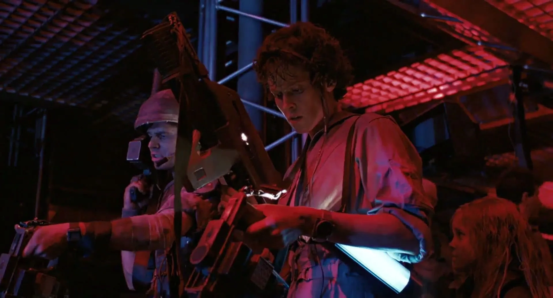 Bill Paxton, Sigourney Weaver, and Carrie Henn in Aliens (1986)