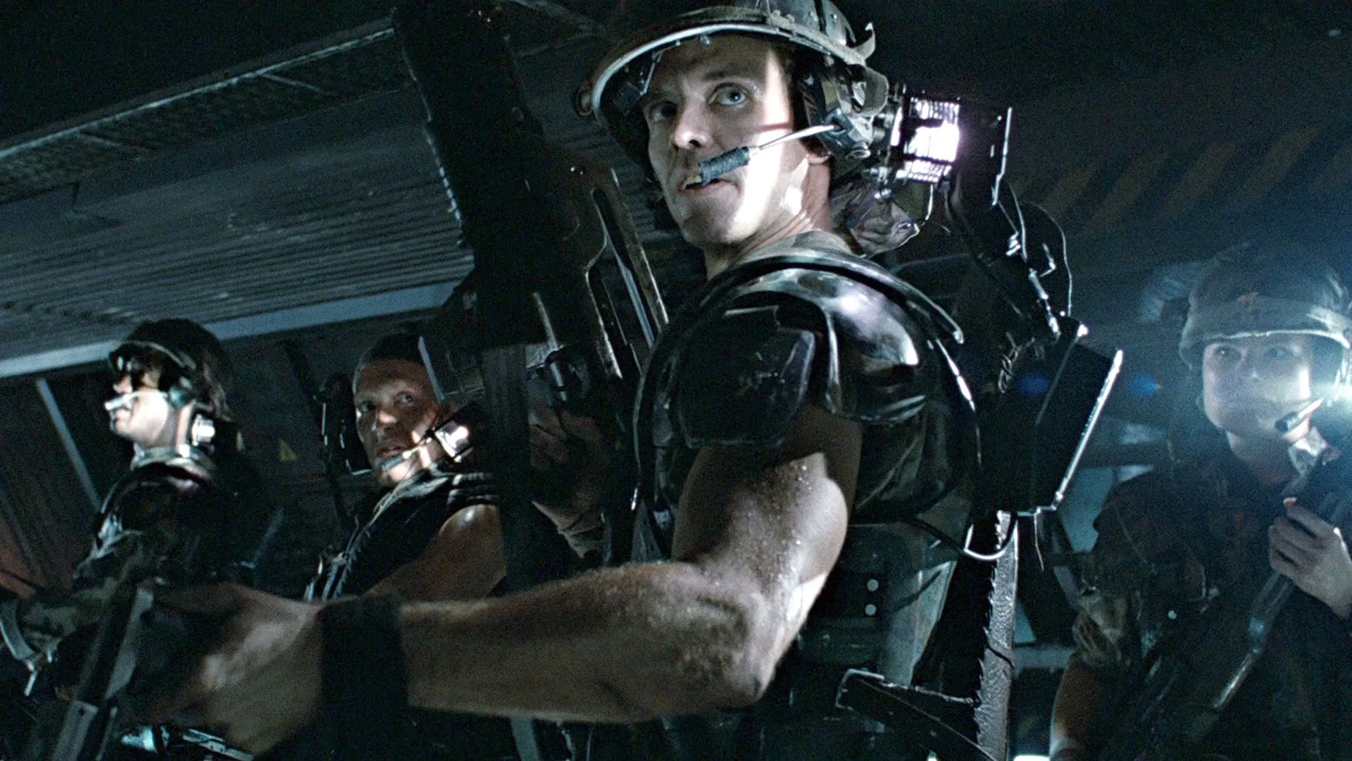 Michael Biehn, Mark Rolston, and Cynthia Dale Scott in Aliens (1986)