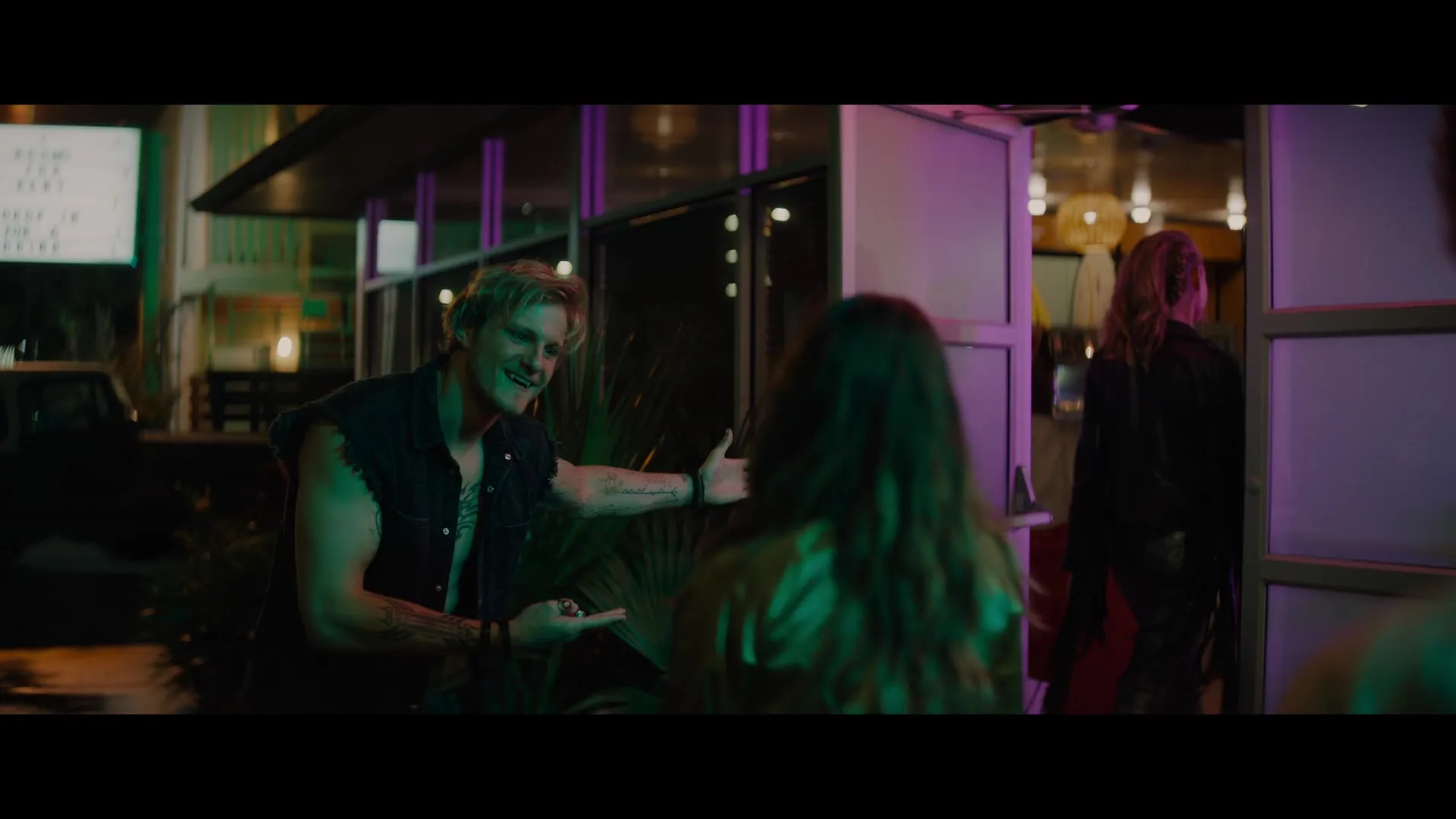 Alexander Ludwig, Debby Ryan, and Lucy Fry in Night Teeth (2021)