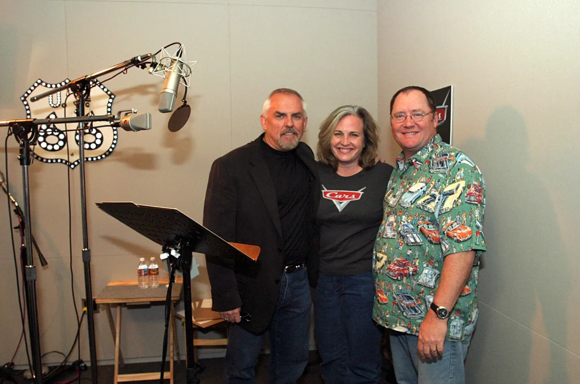 John Ratzenberger, John Lasseter, and Darla K. Anderson in Cars (2006)