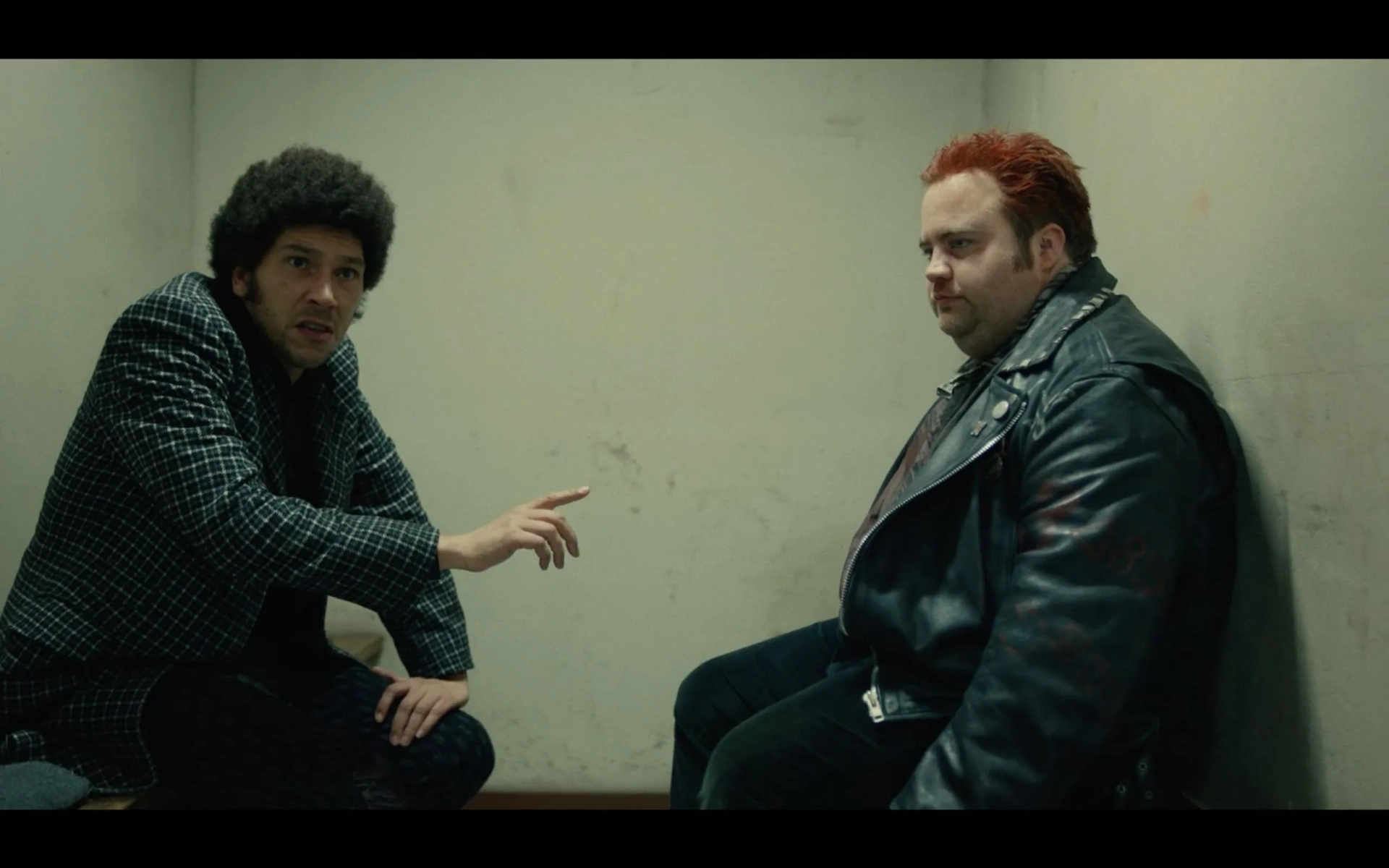 Joel Fry and Paul Walter Hauser in Cruella (2021)