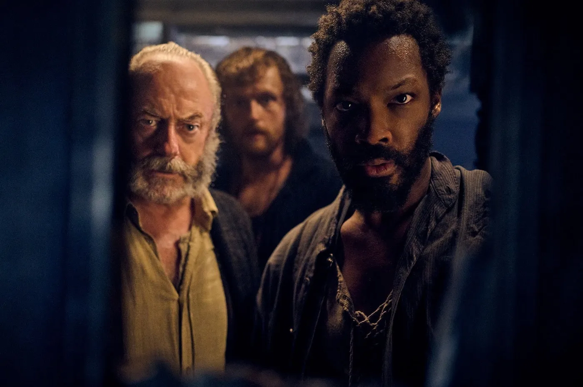 Liam Cunningham, Corey Hawkins, and Chris Walley in The Last Voyage of the Demeter (2023)