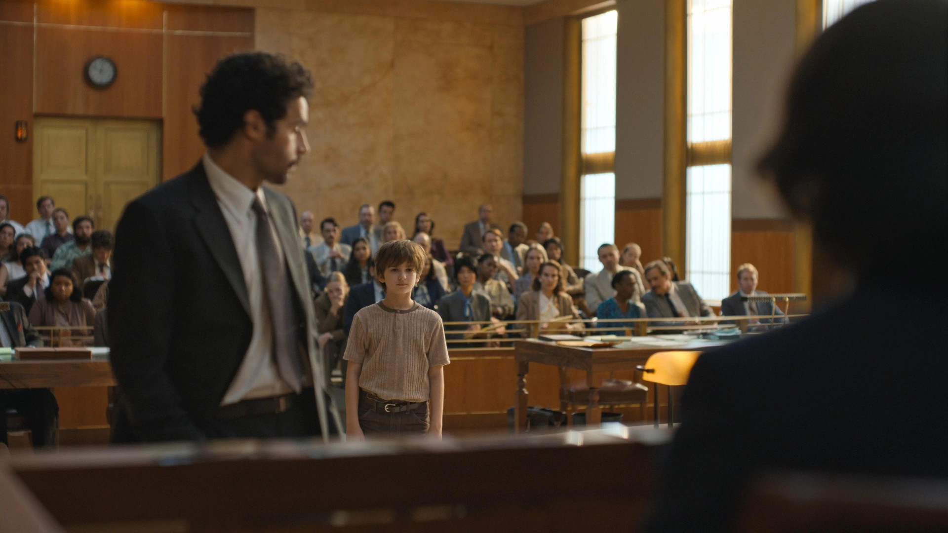 Zachary Golinger as "Adam" and Christopher Abbott as "Stan Camisa" in Episode 10 "Judgment" of The Crowded Room on Apple TV+