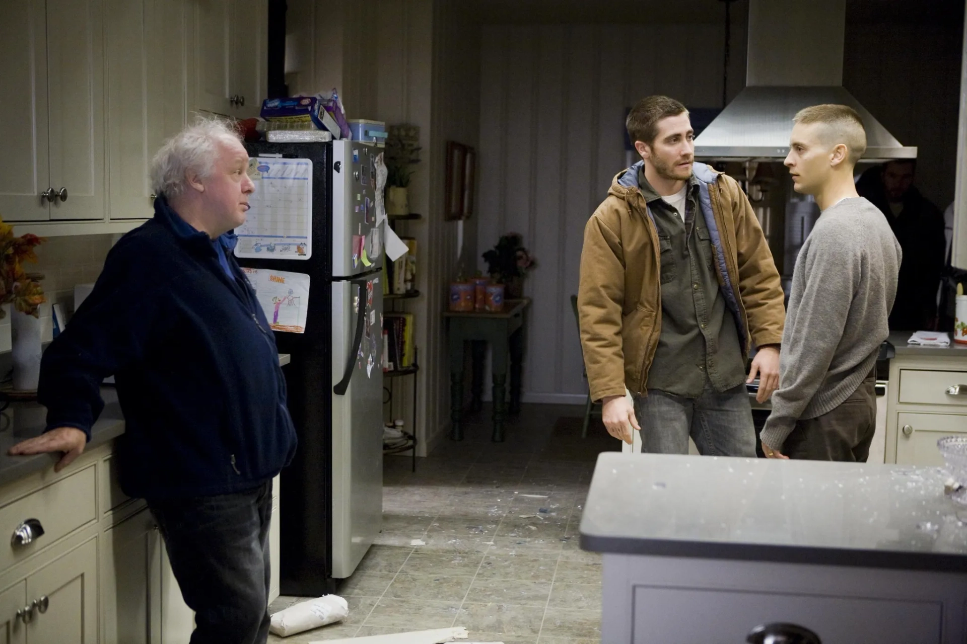 Tobey Maguire, Jim Sheridan, and Jake Gyllenhaal in Brothers (2009)