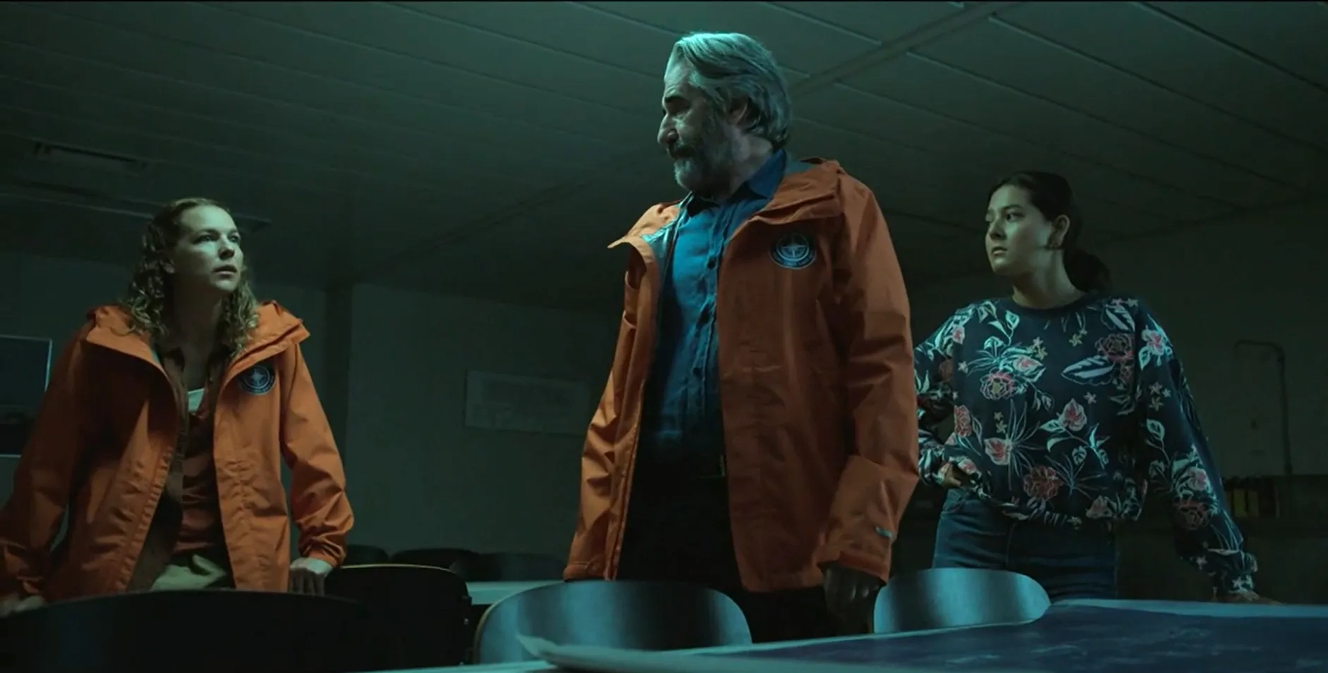 John Lynch, Josefin Neldén, and Nora Rios in The Head: Episode X (2022)