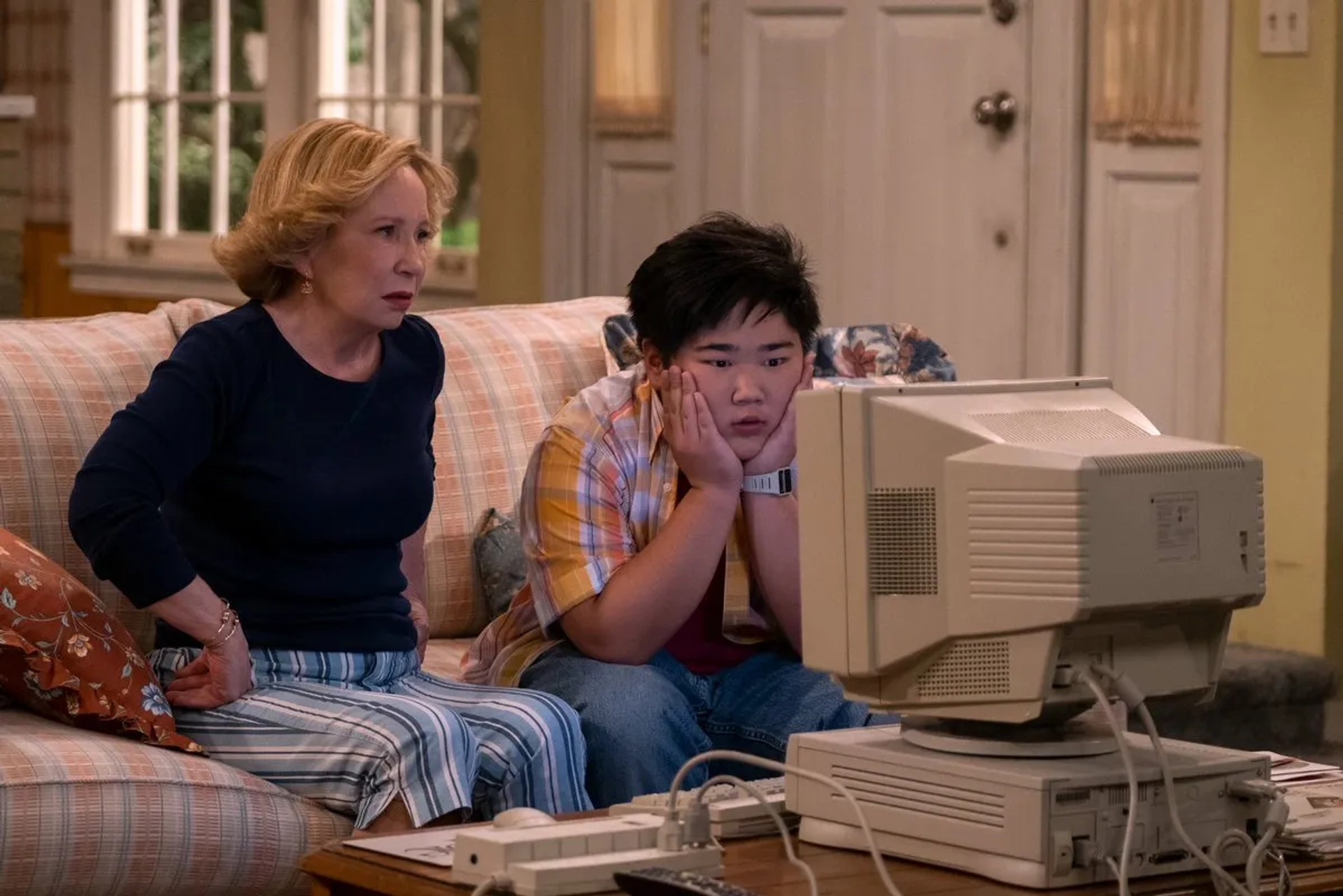 Debra Jo Rupp and Reyn Doi in That '90s Show (2023)