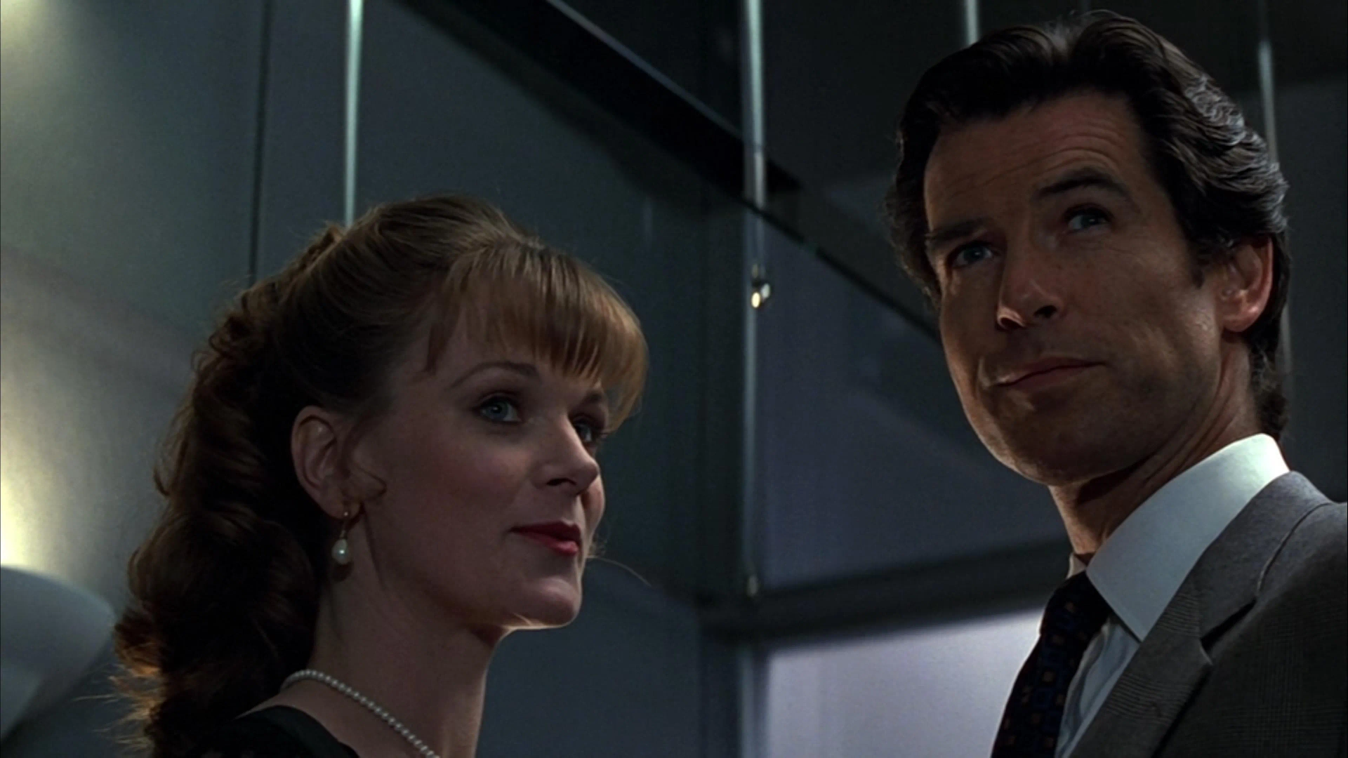 Pierce Brosnan and Samantha Bond in GoldenEye (1995)