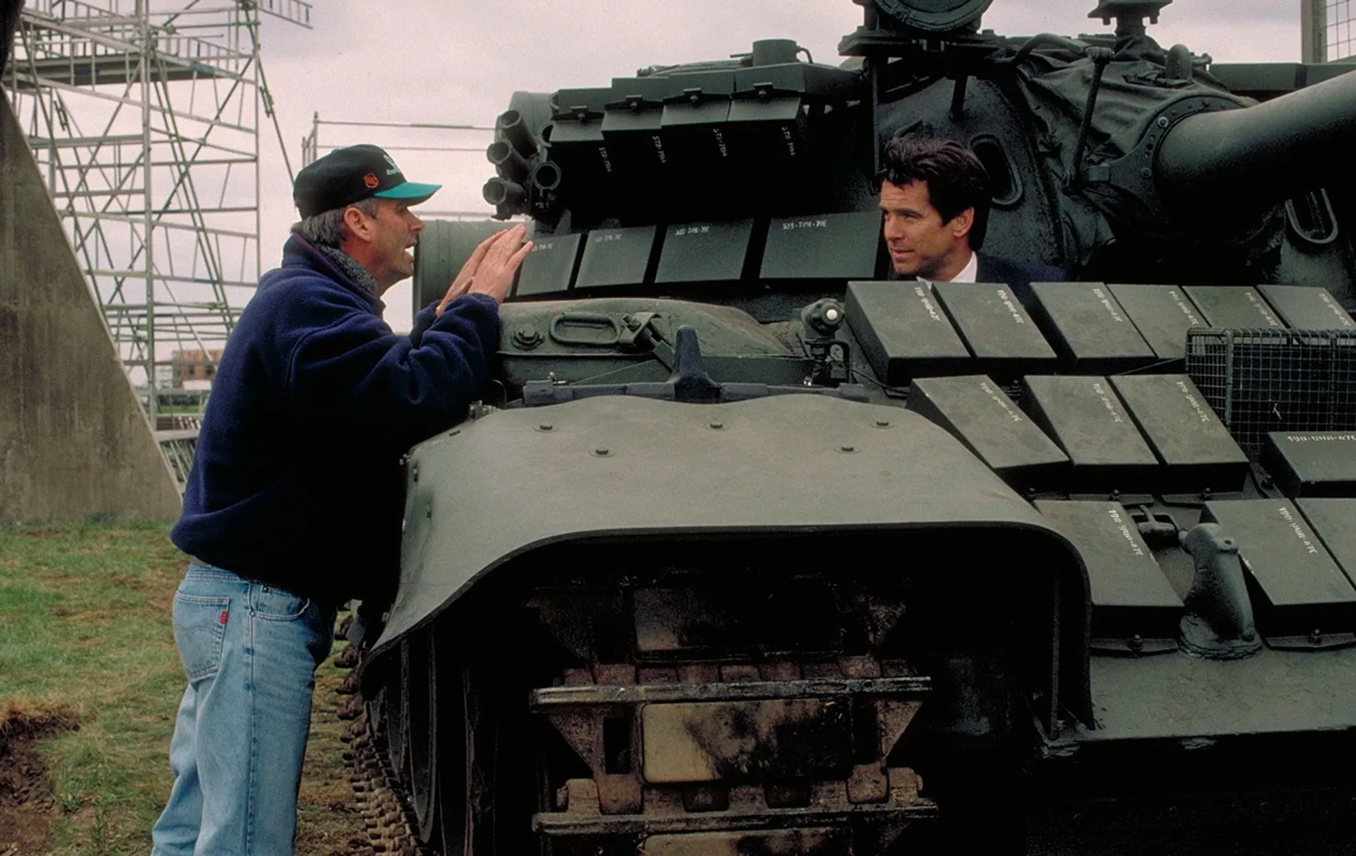 Pierce Brosnan and Martin Campbell in GoldenEye (1995)