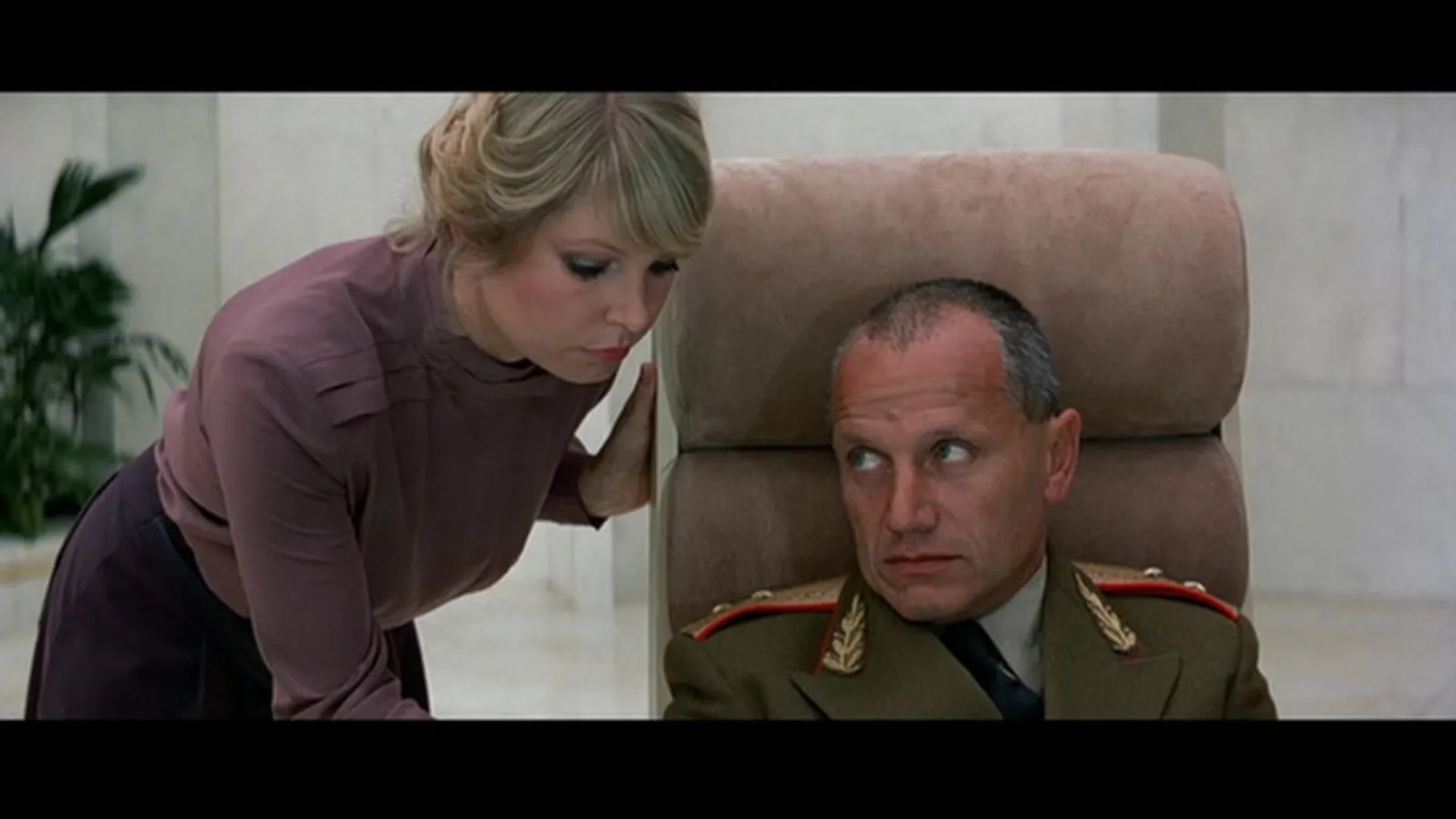 Steven Berkoff and Eva Reuber-Staier in Octopussy (1983)