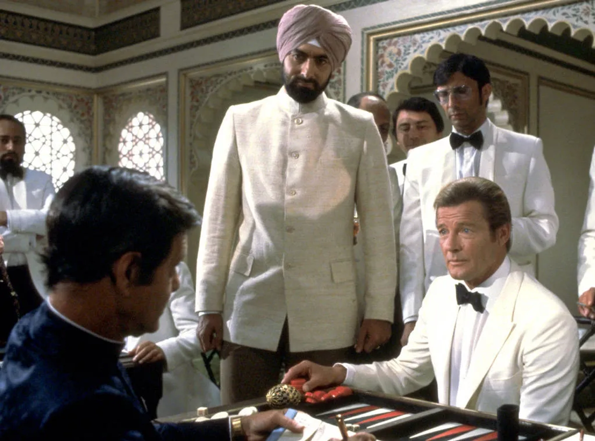 Roger Moore, Kabir Bedi, and Louis Jourdan in Octopussy (1983)