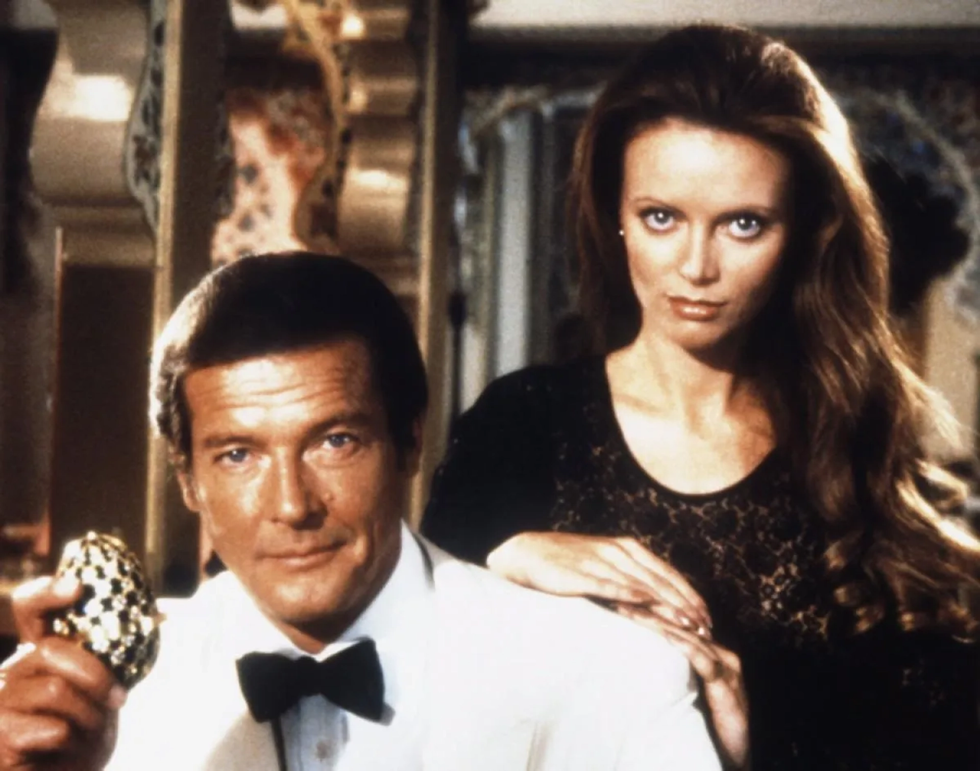 Roger Moore and Kristina Wayborn in Octopussy (1983)