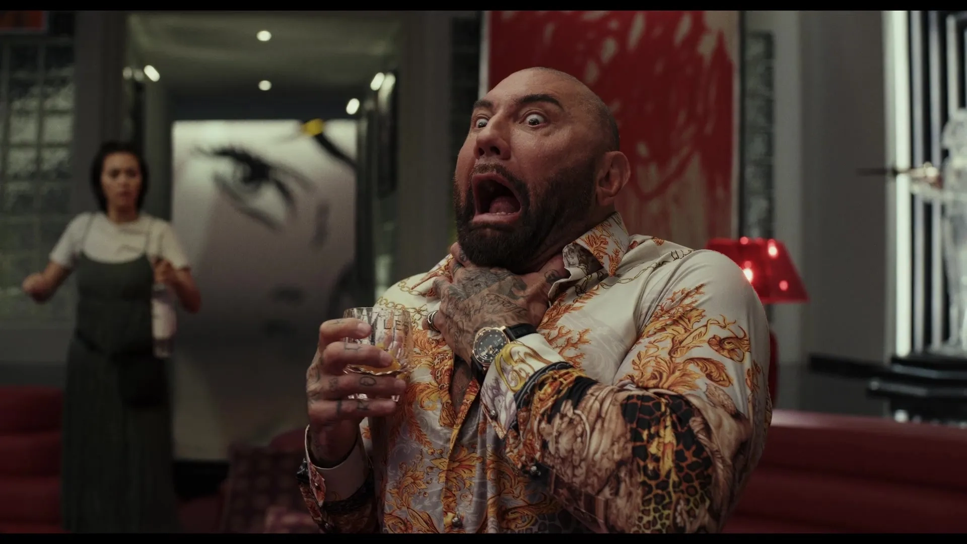 Dave Bautista and Jessica Henwick in Glass Onion (2022)