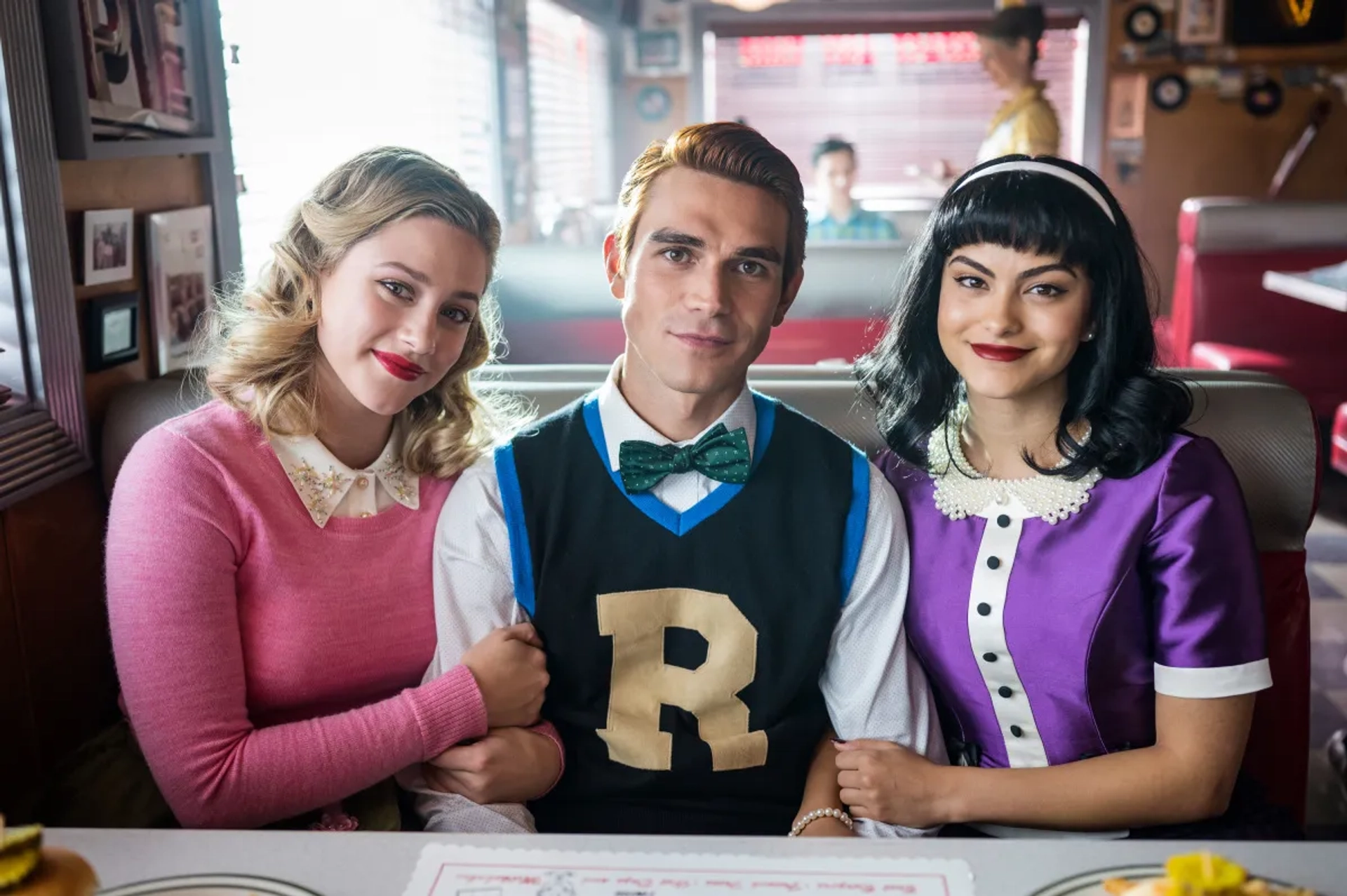 Lili Reinhart, Camila Mendes, and K.J. Apa in Riverdale: Chapter One Hundred: The Jughead Paradox (2021)