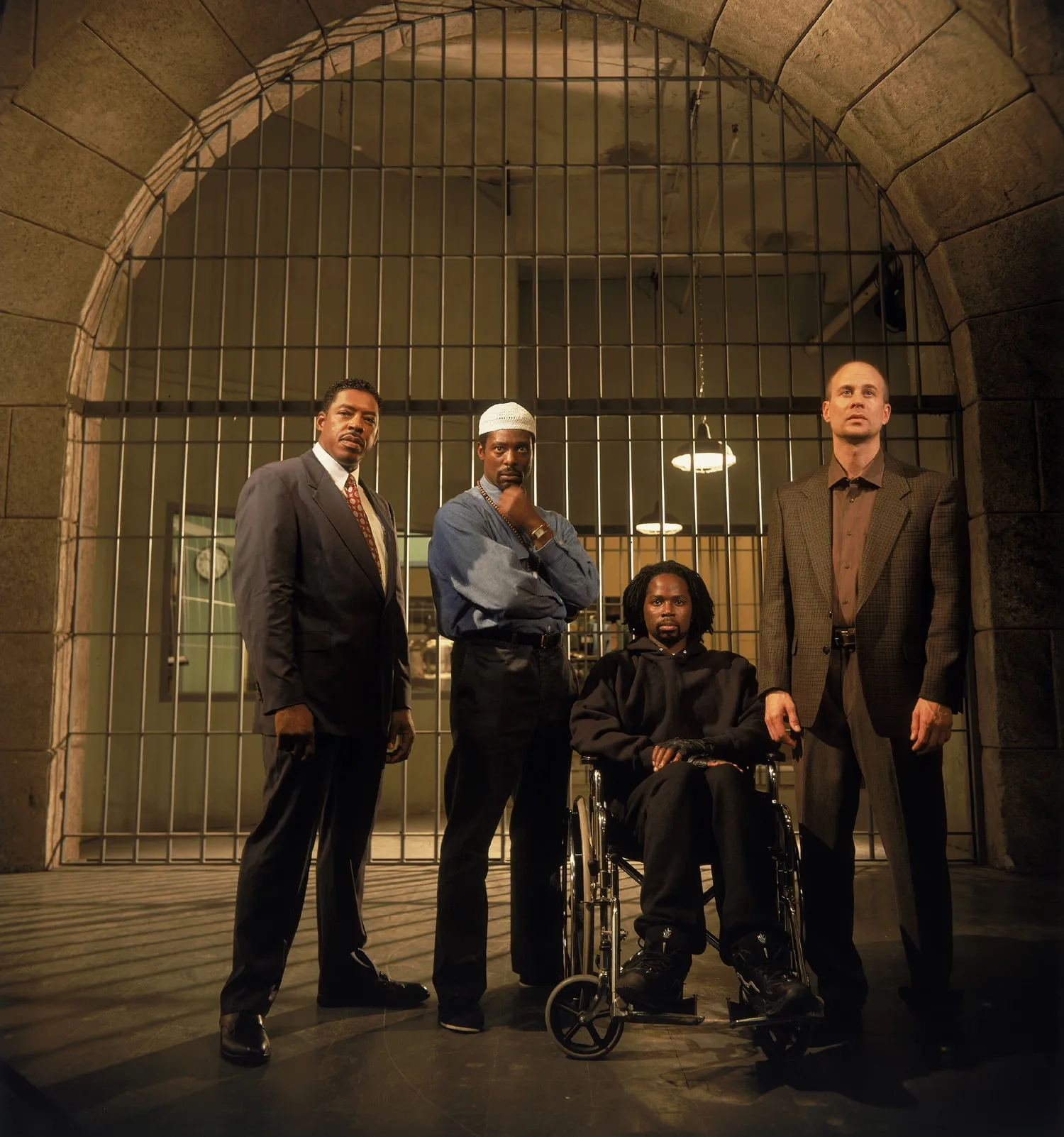 Ernie Hudson, Terry Kinney, Harold Perrineau, and Eamonn Walker in Oz (1997)