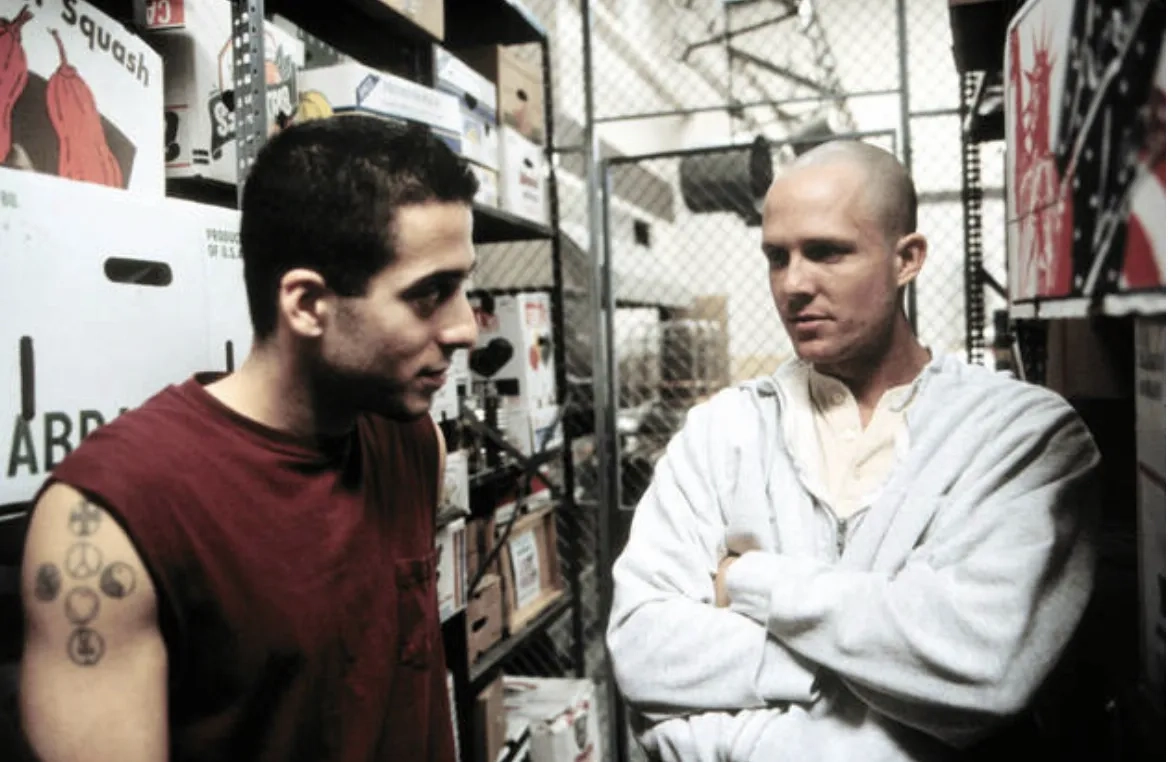 Kirk Acevedo and Dean Winters in Oz (1997)
