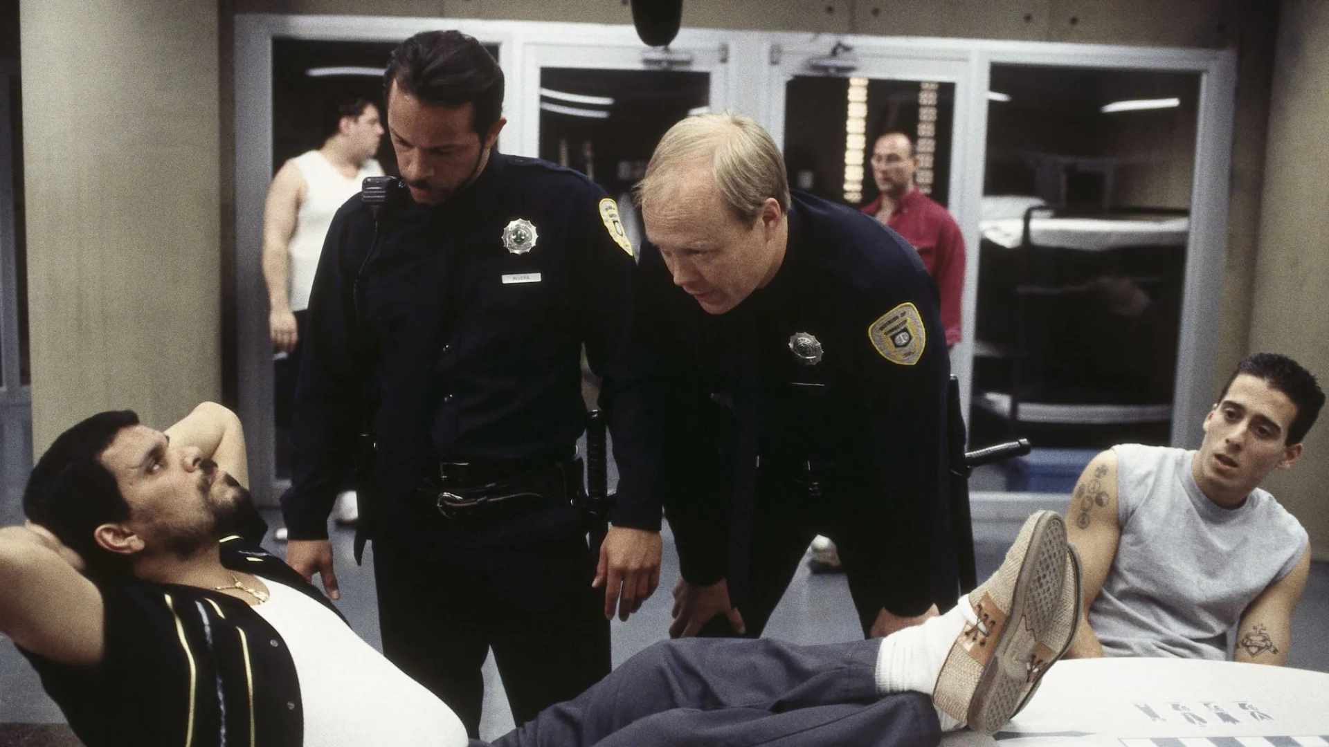 Kirk Acevedo, Bill Fagerbakke, Luis Guzmán, and Nelson Vasquez in Oz (1997)