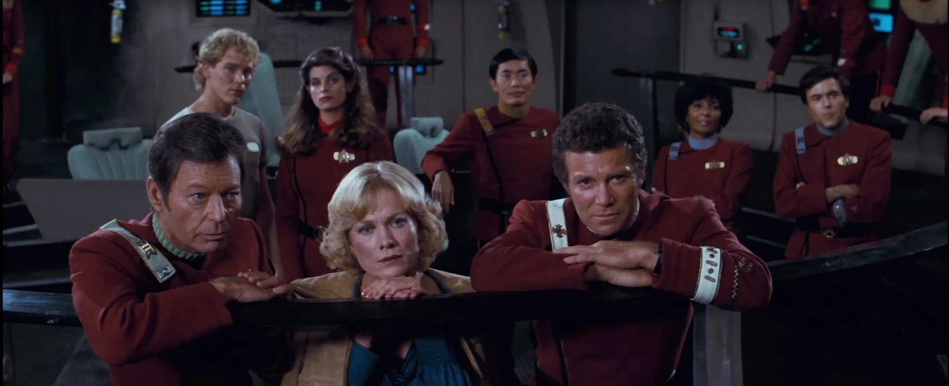 Kirstie Alley, Walter Koenig, William Shatner, Bibi Besch, DeForest Kelley, George Takei, Merritt Butrick, and Nichelle Nichols in Star Trek II: The Wrath of Khan (1982)