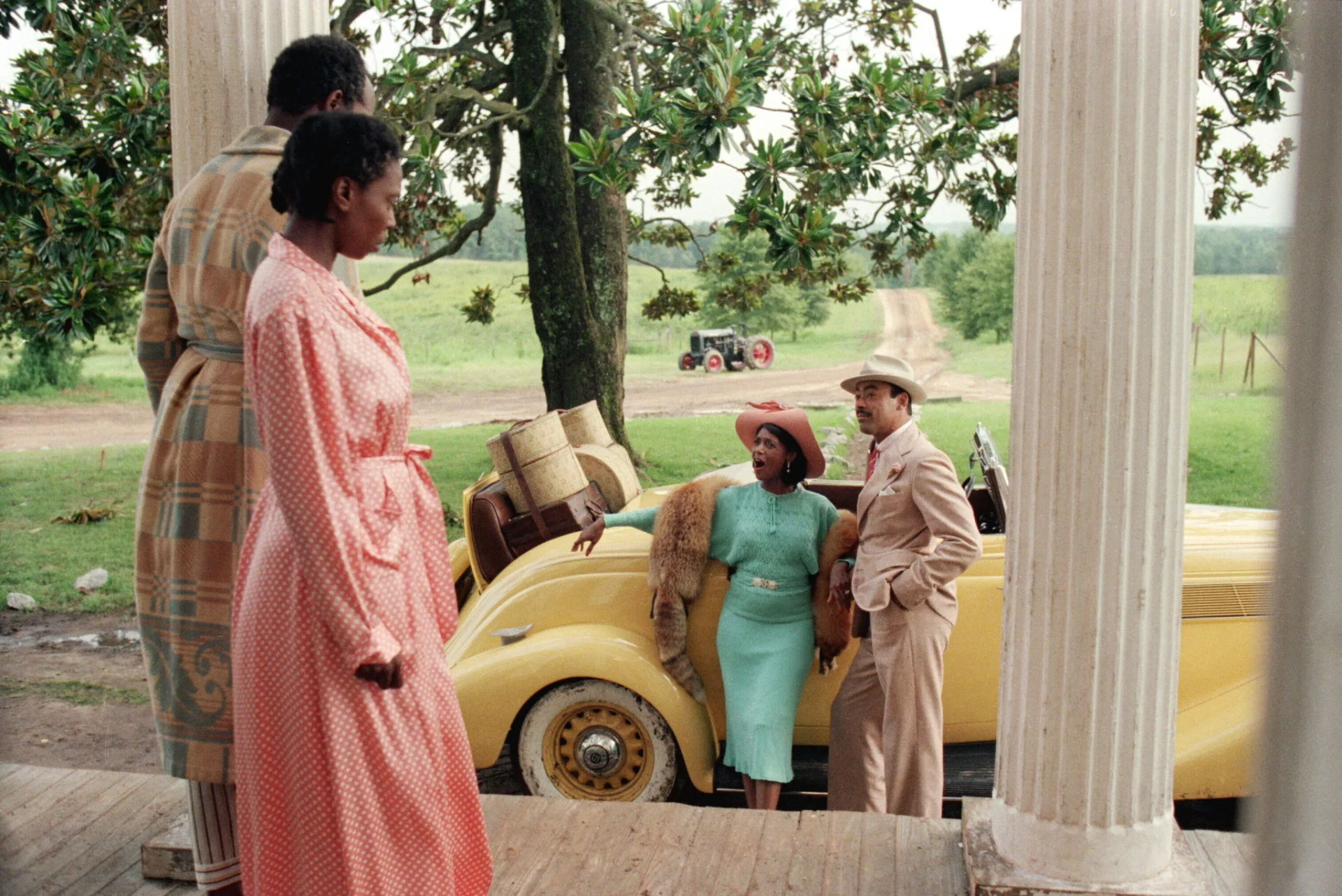 Whoopi Goldberg, Danny Glover, Margaret Avery, and Bennet Guillory in The Color Purple (1985)