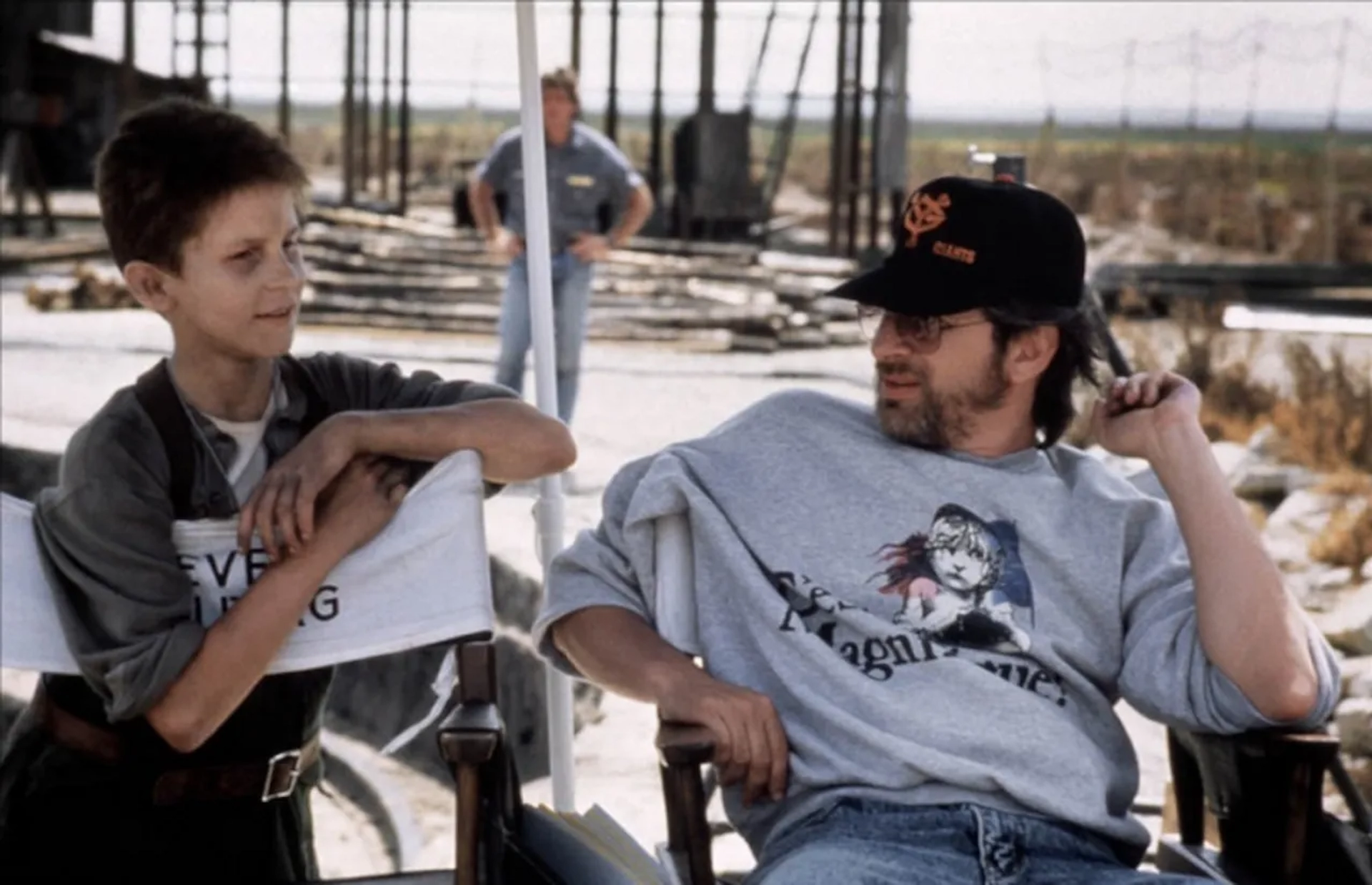 Steven Spielberg and Christian Bale in Empire of the Sun (1987)