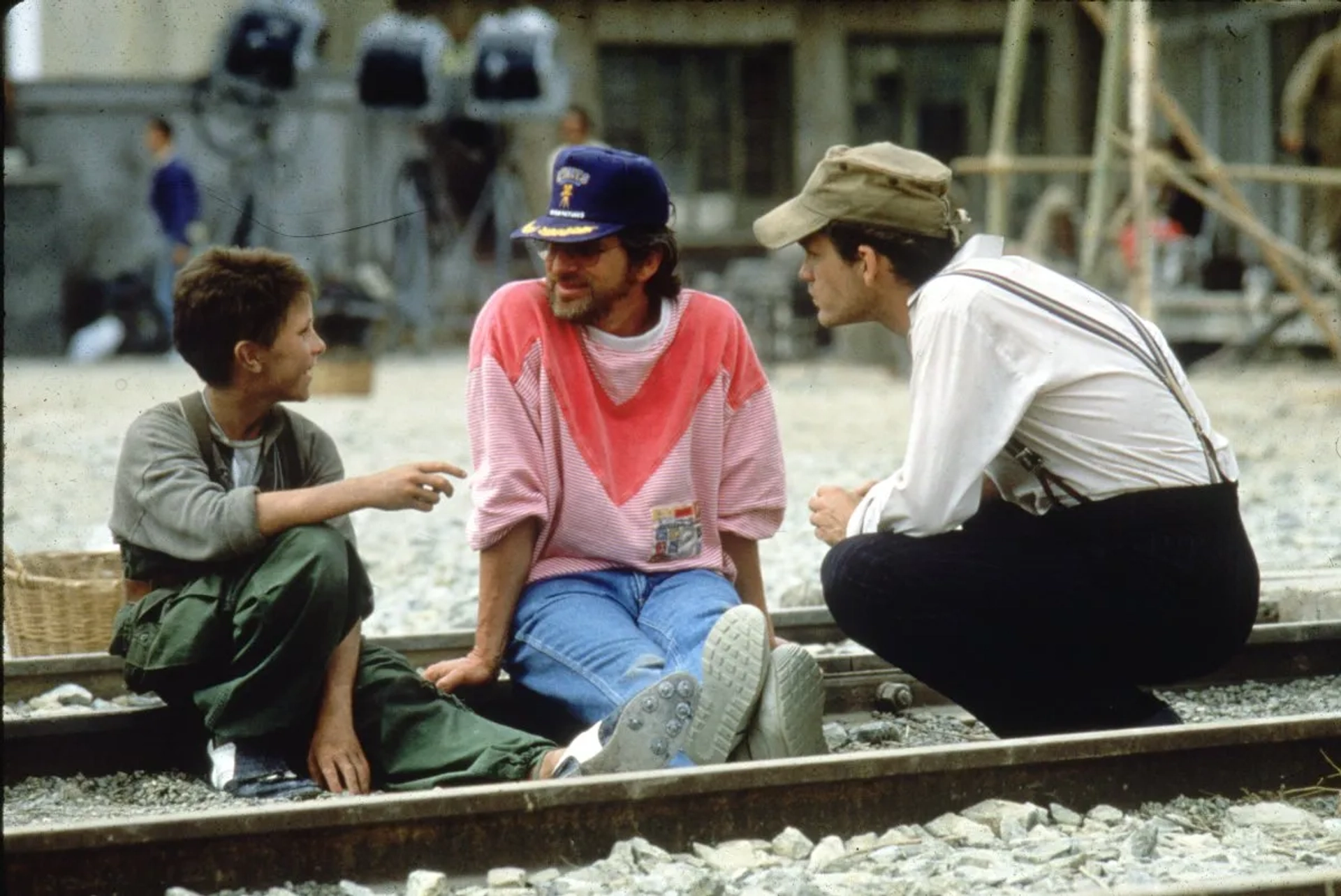 Steven Spielberg, Christian Bale, and John Malkovich in Empire of the Sun (1987)