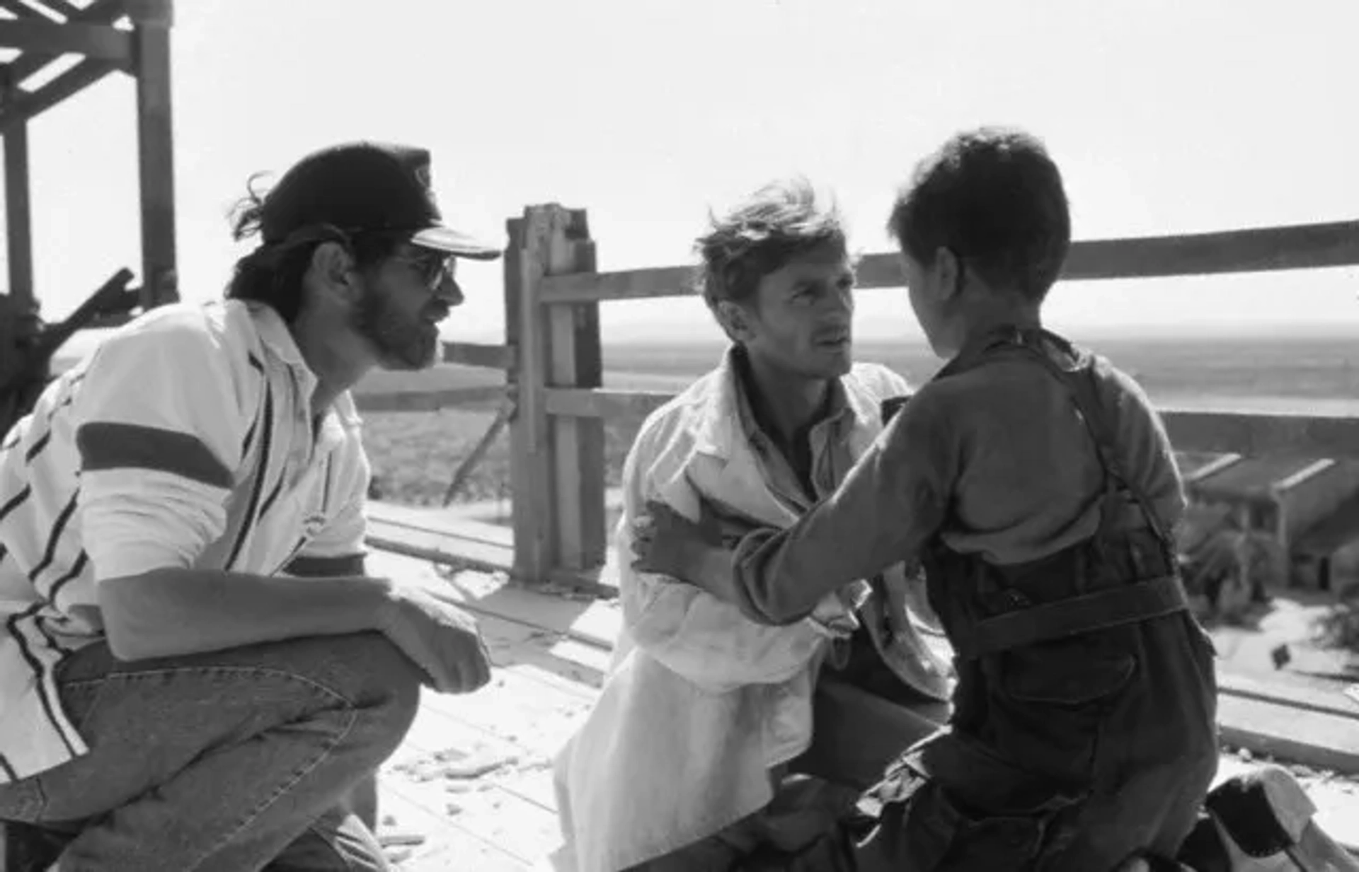 Steven Spielberg, Christian Bale, and Nigel Havers in Empire of the Sun (1987)