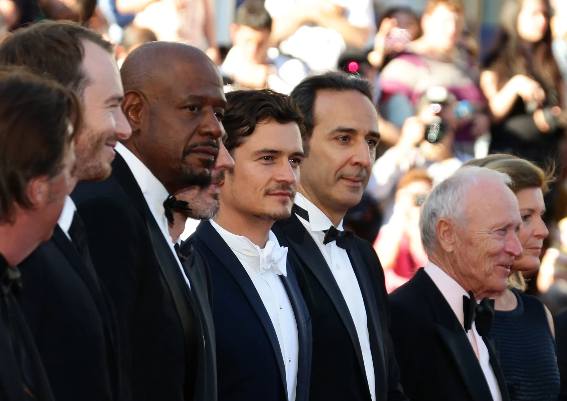 Forest Whitaker, Alexandre Desplat, Orlando Bloom, and Conrad Kemp at an event for Zulu (2013)