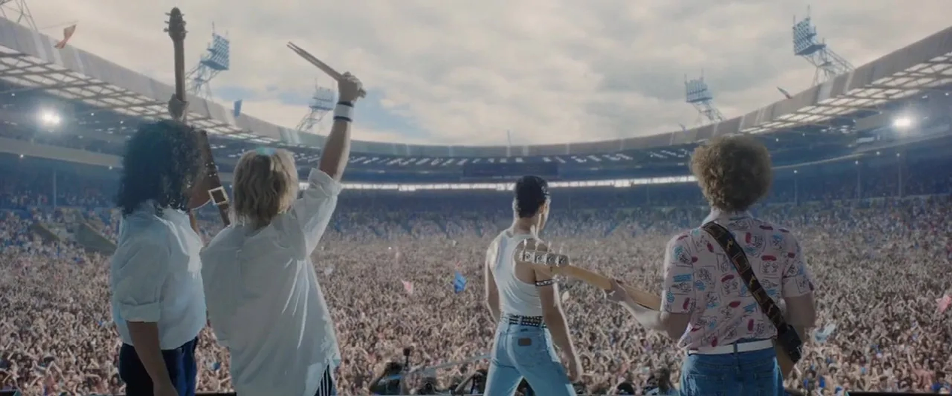 Joseph Mazzello, Rami Malek, Gwilym Lee, and Ben Hardy in Bohemian Rhapsody (2018)