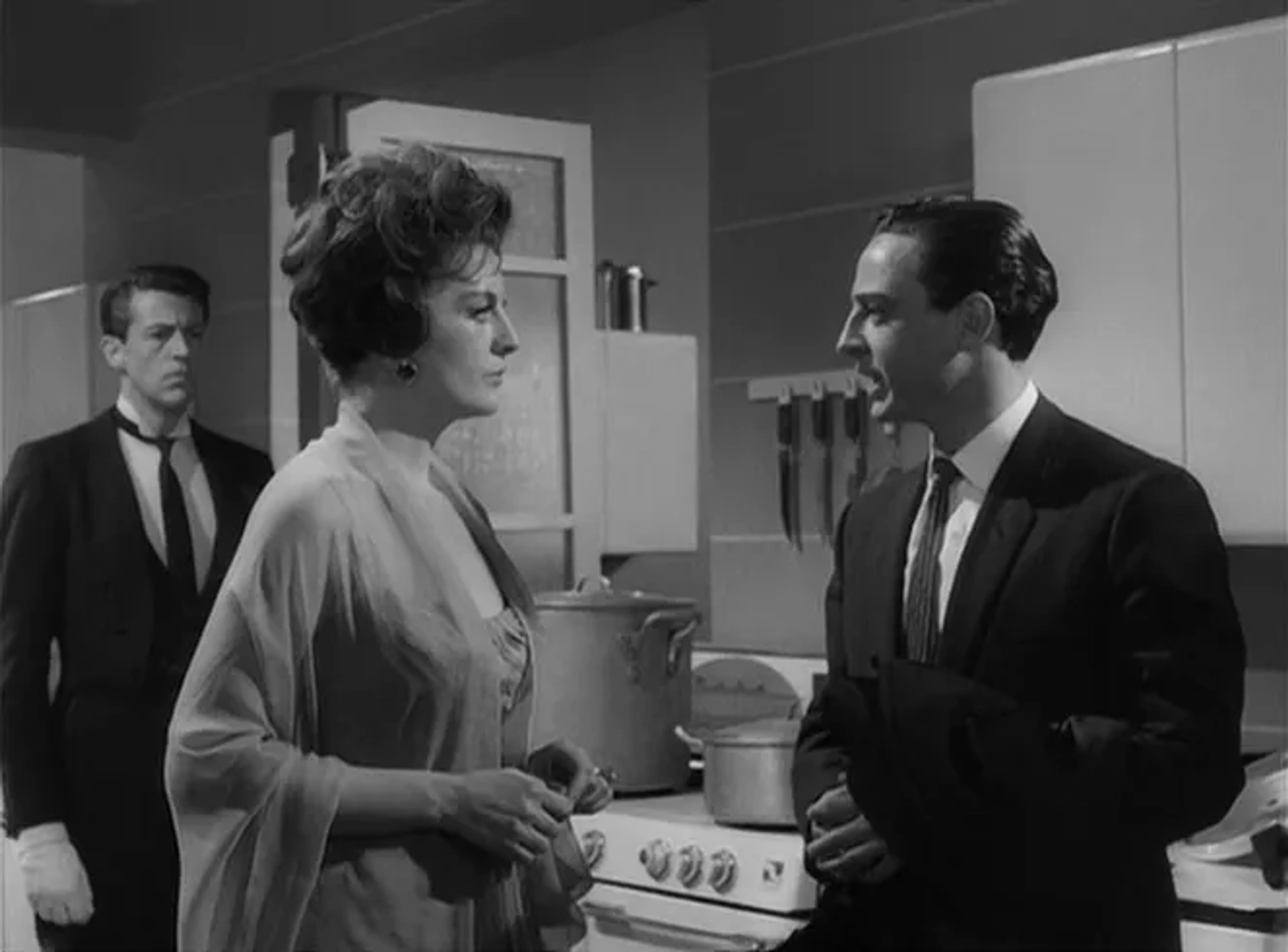 Claudio Brook, David Hayat, and Lucy Gallardo in The Exterminating Angel (1962)