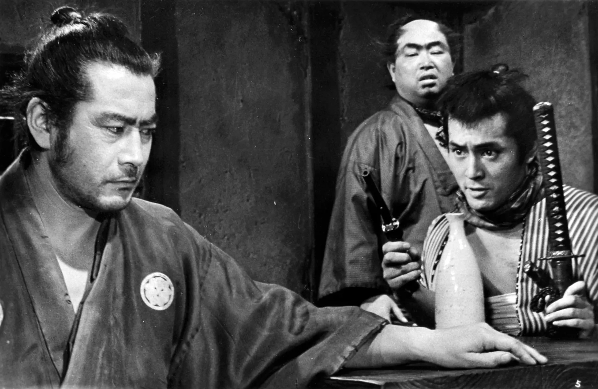 Toshirô Mifune, Daisuke Katô, and Tatsuya Nakadai in Yojimbo (1961)