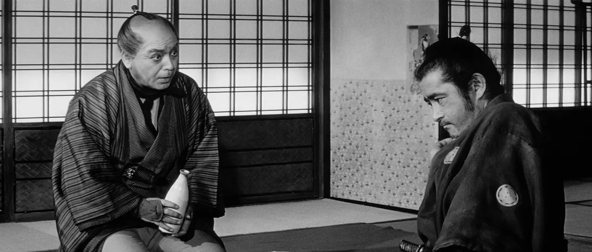 Toshirô Mifune and Seizaburô Kawazu in Yojimbo (1961)