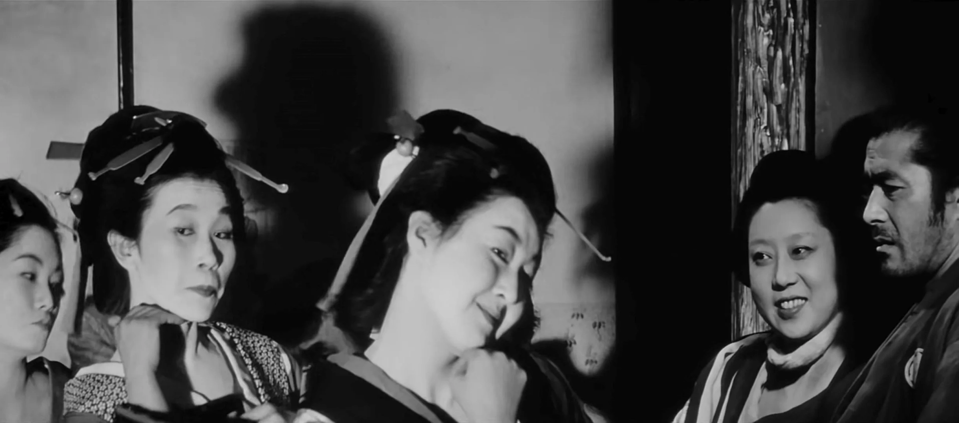 Toshirô Mifune and Isuzu Yamada in Yojimbo (1961)