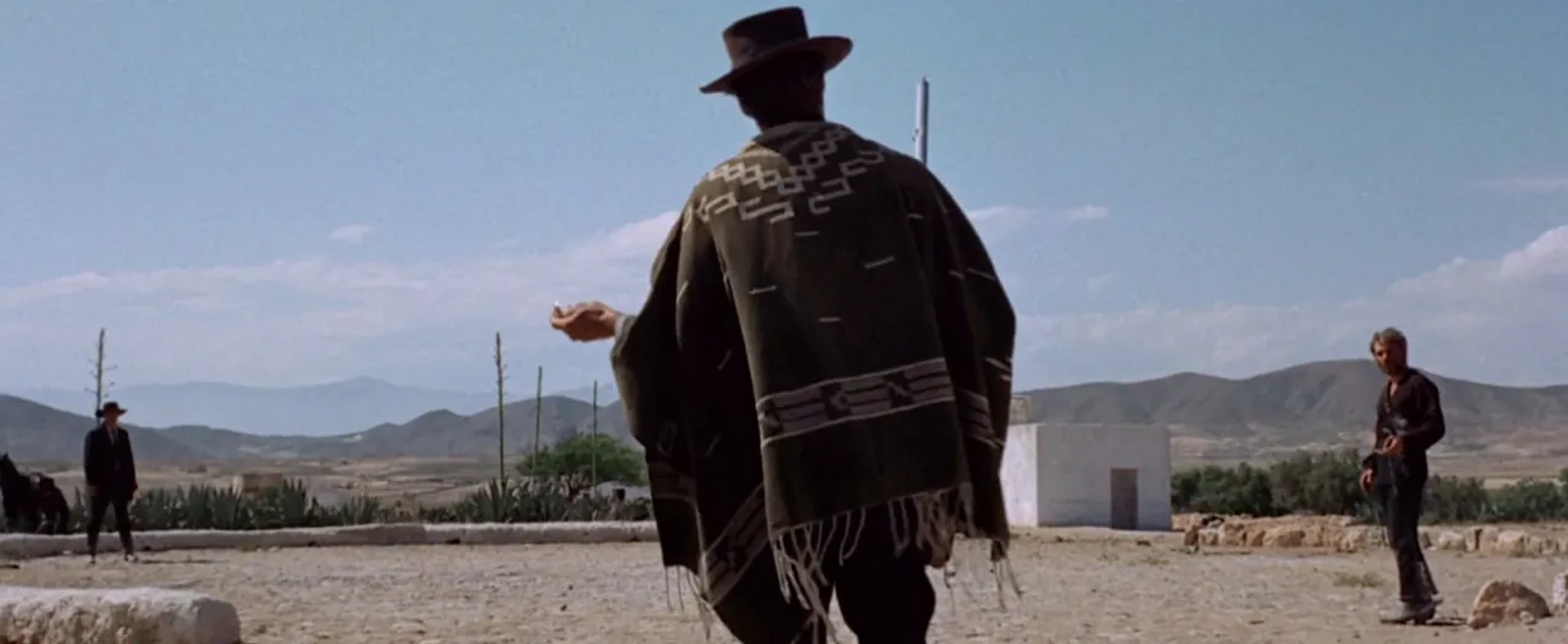 Lee Van Cleef and Gian Maria Volontè in For a Few Dollars More (1965)